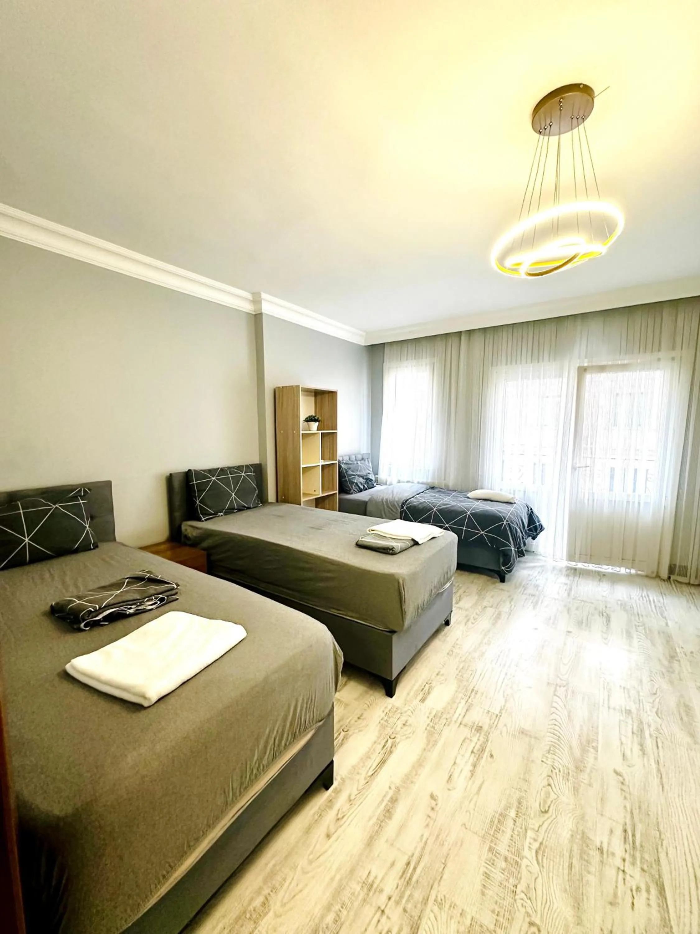 Bed in Blueway Hotel Residence