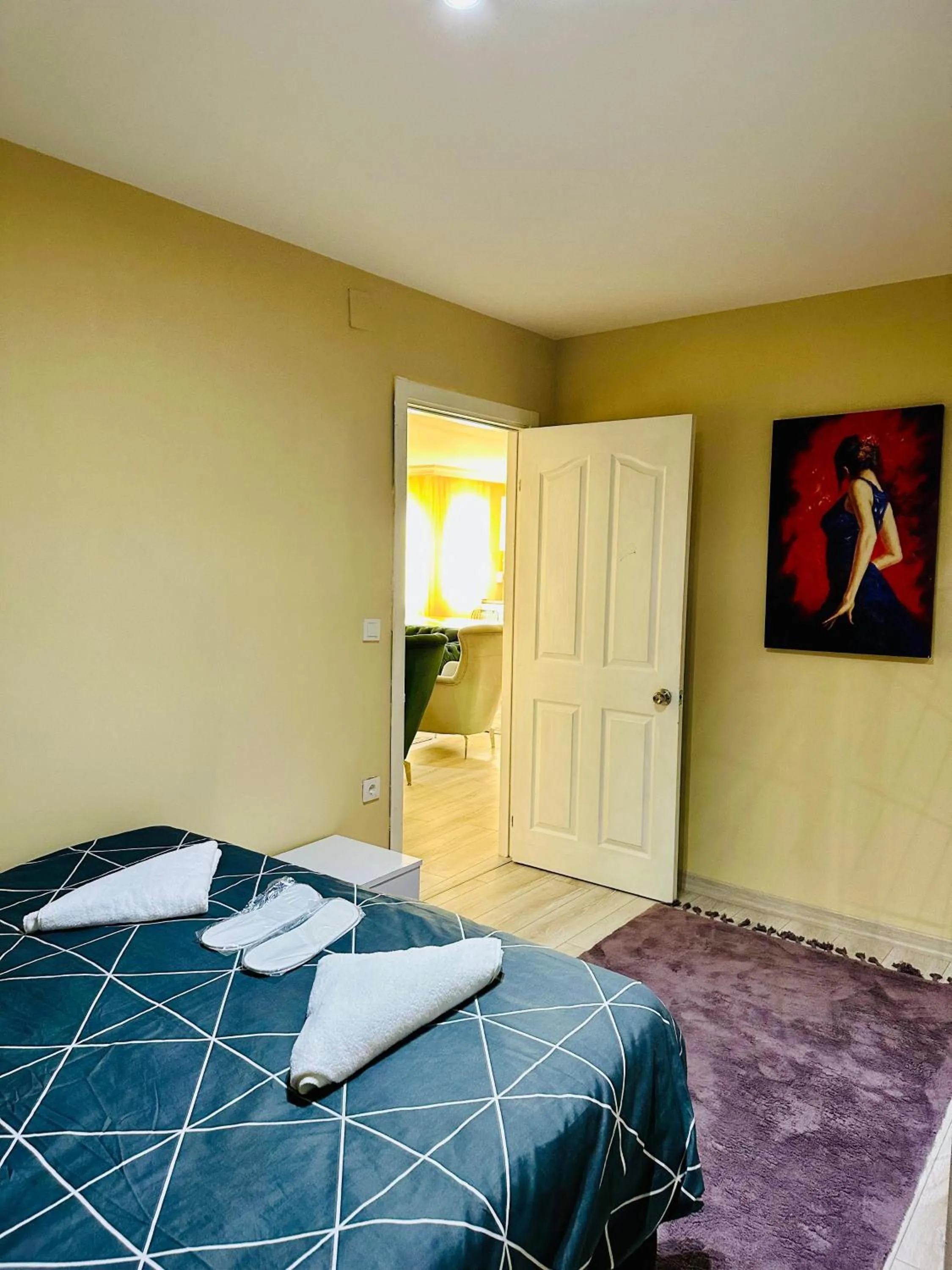 Bed in Blueway Hotel Residence