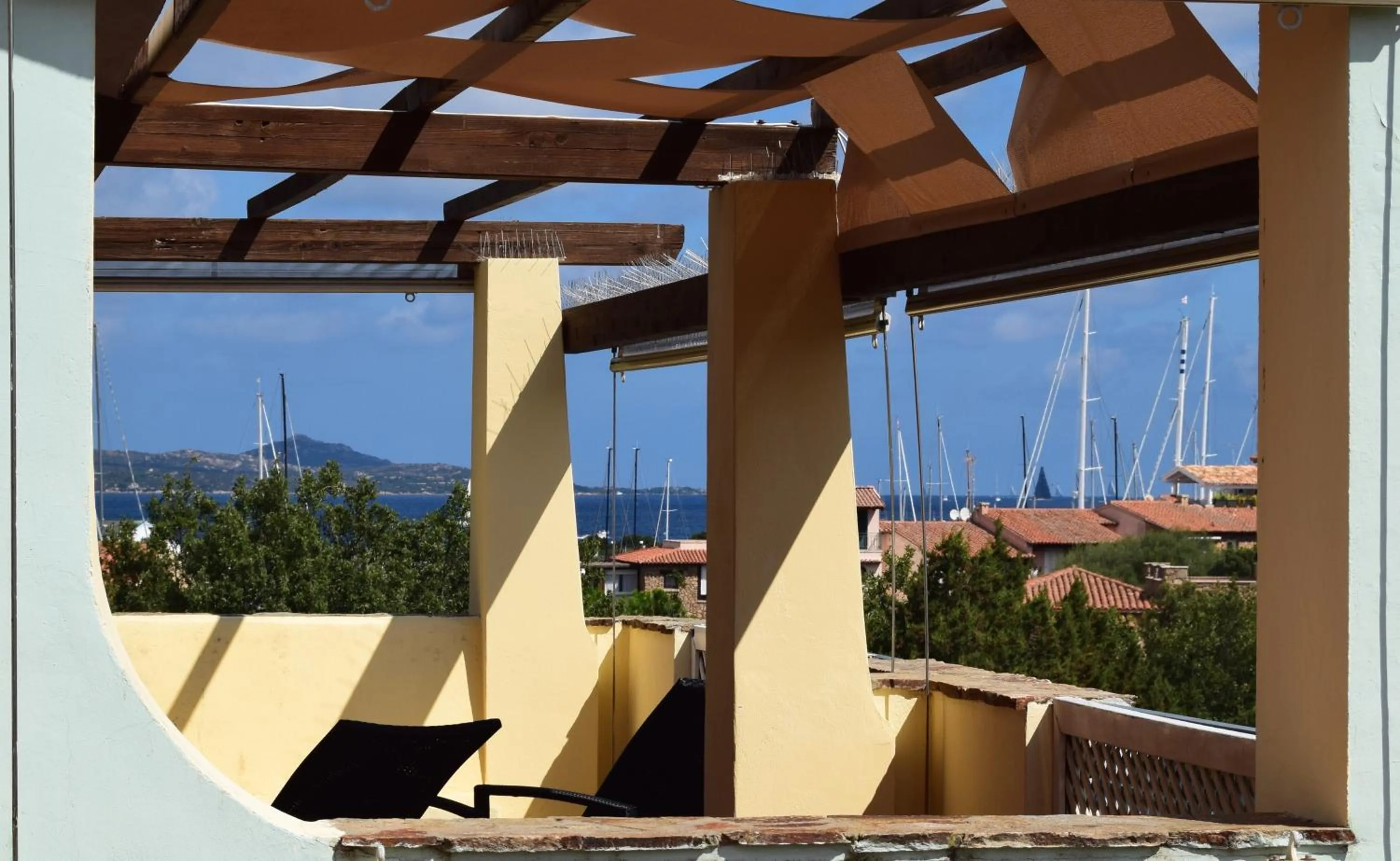 Property building in Villaggio Smeralda by Sardegna Smeralda Suite