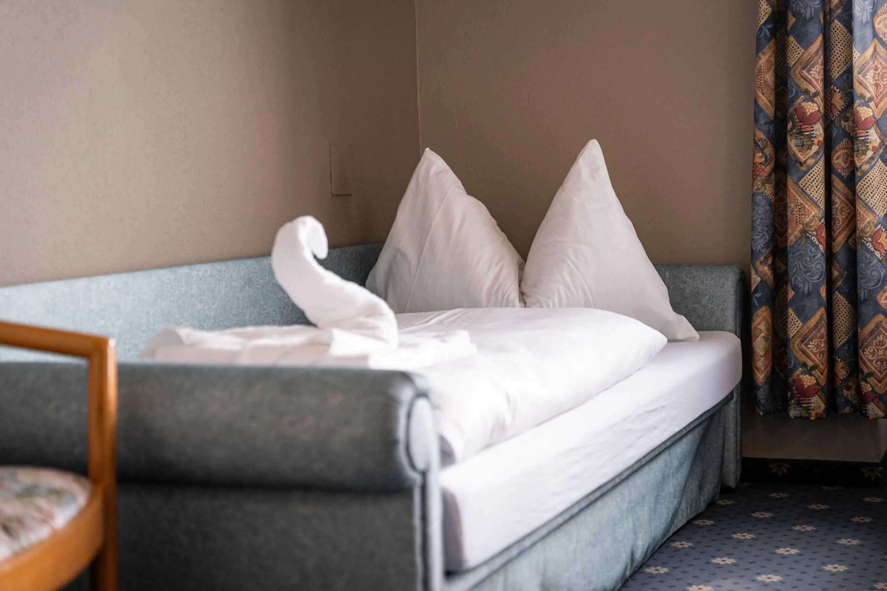 Bedroom in PanoramaHotel Penegal