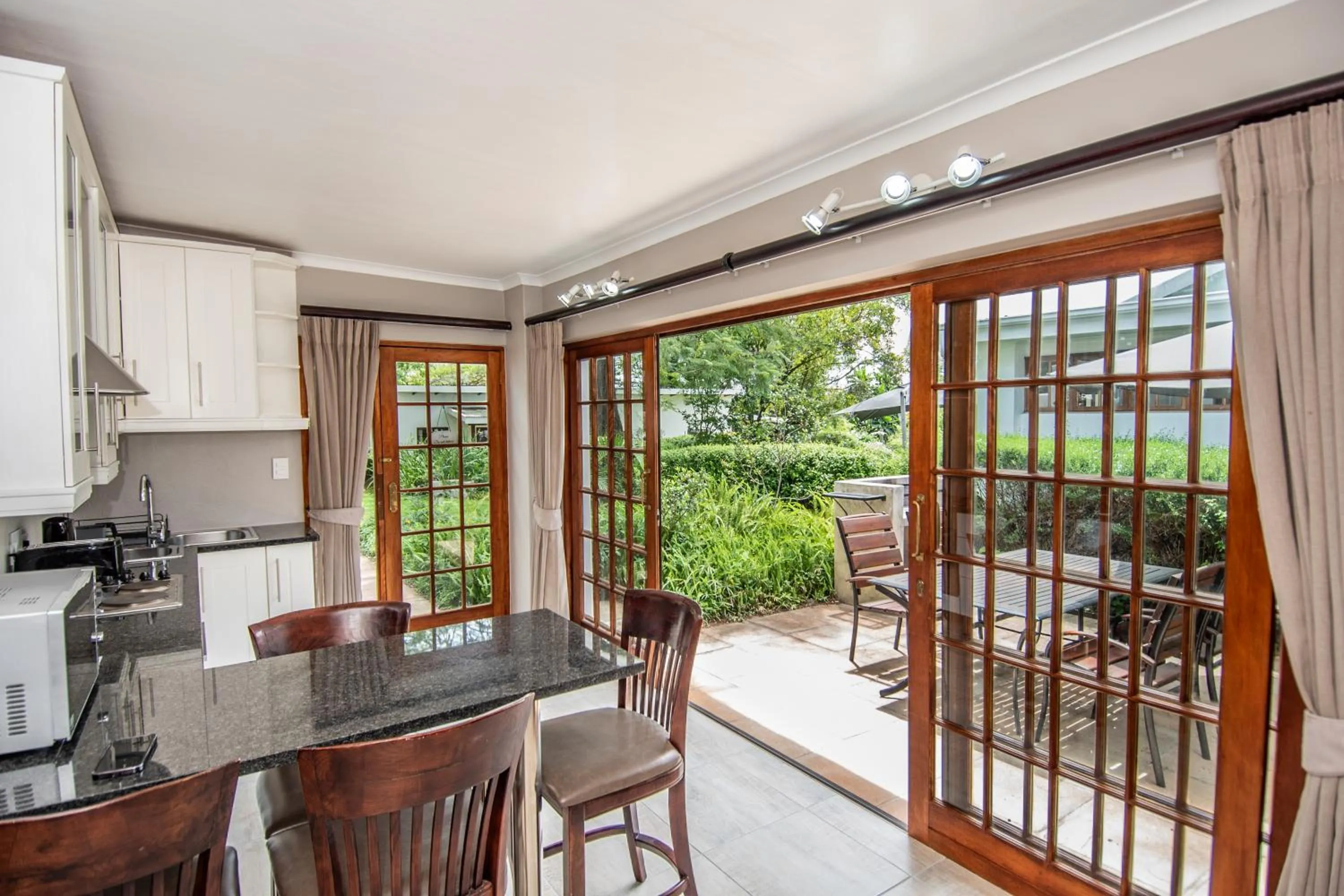 Kitchen or kitchenette in Nut Grove Boutique Hotel