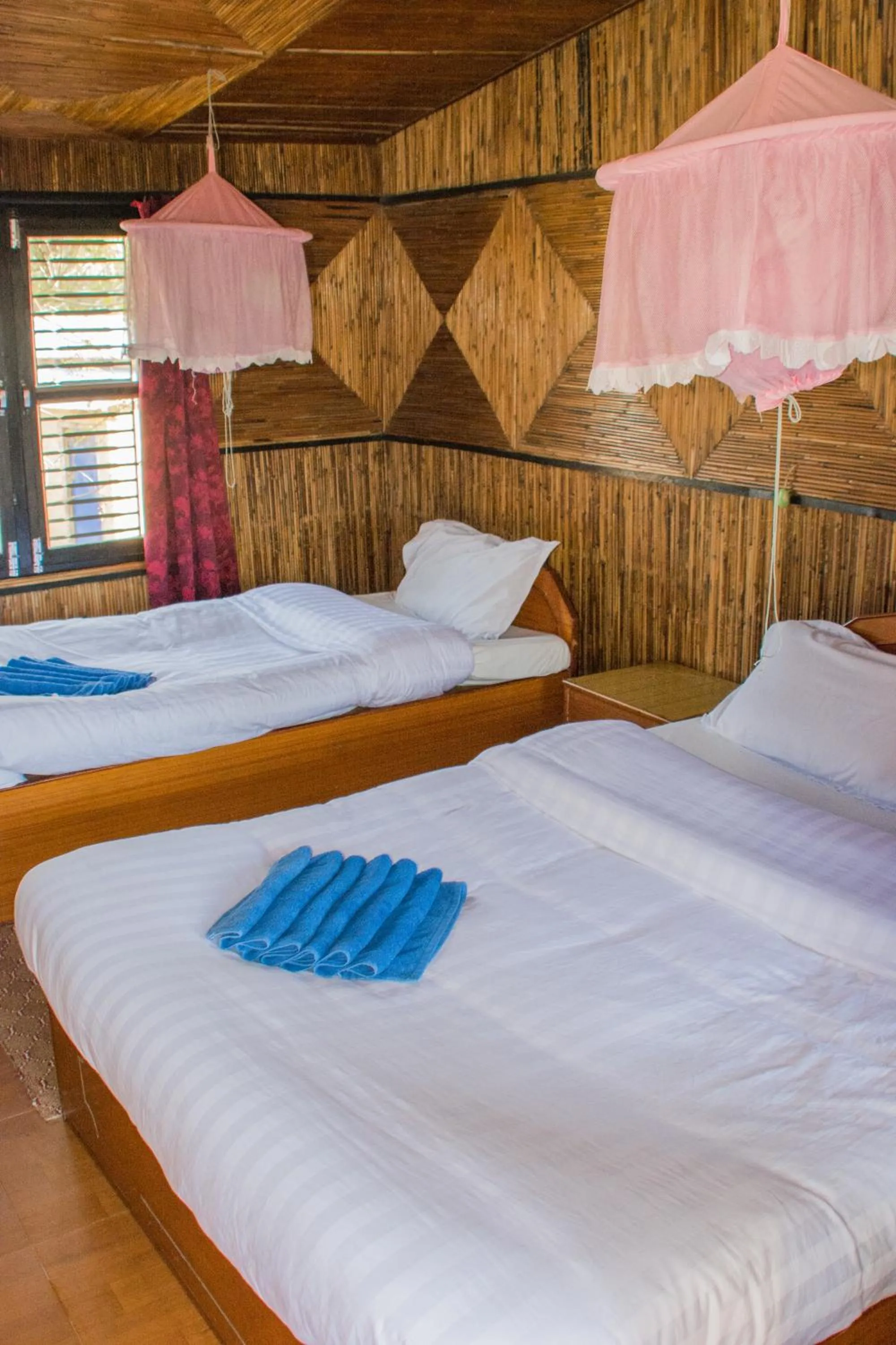 Bed in Chitwan Tiger Camp