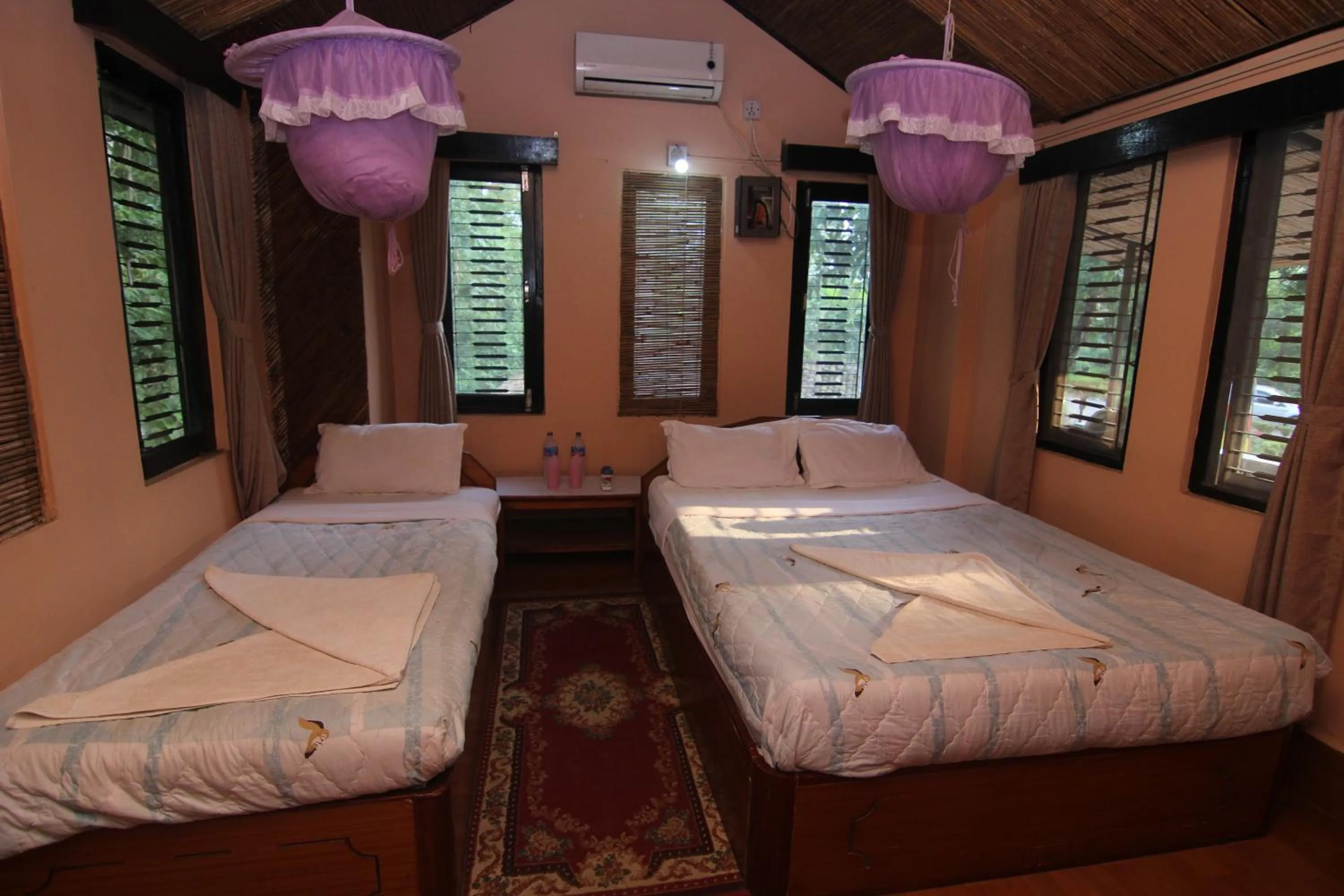 Bed in Chitwan Tiger Camp