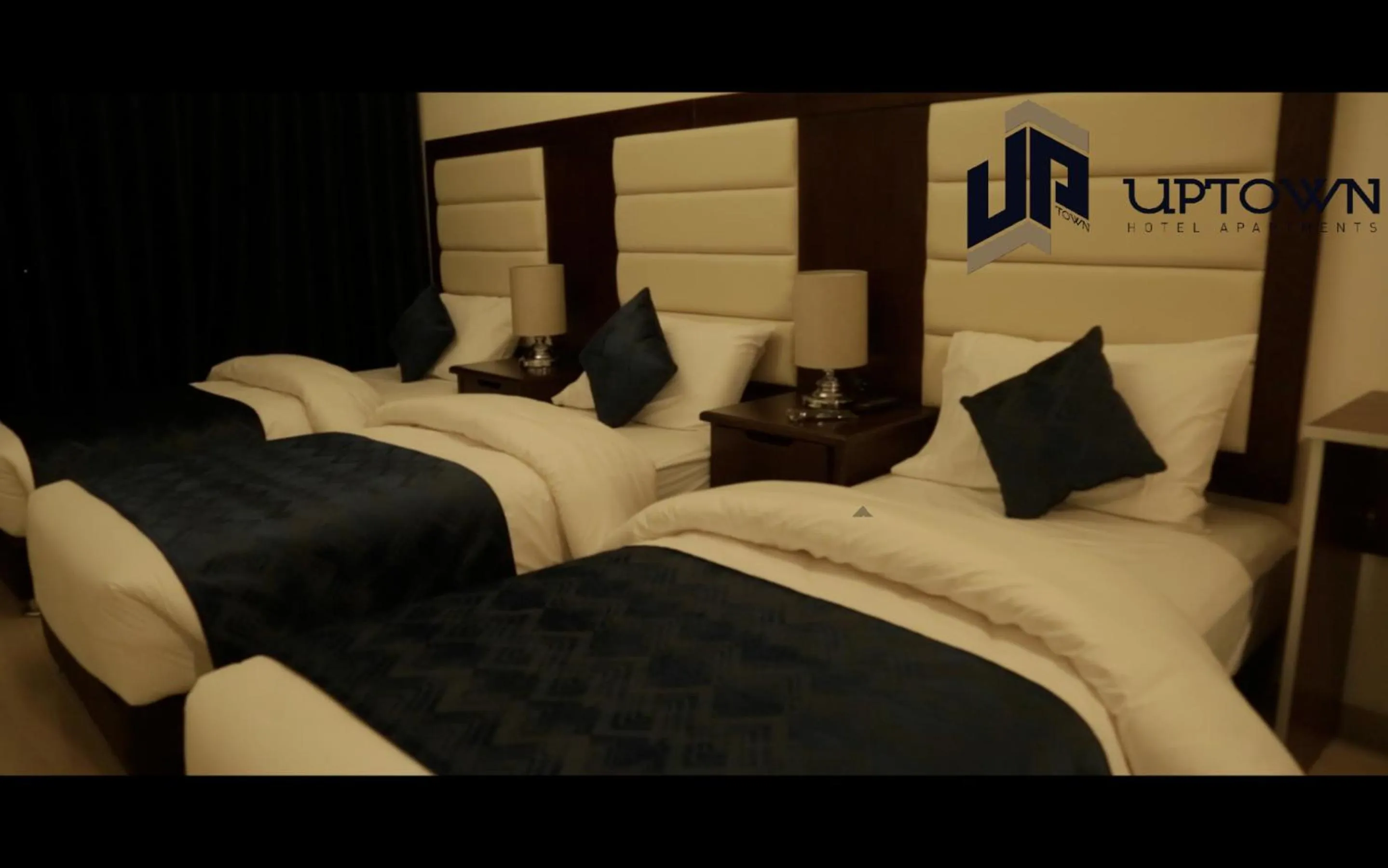 Bedroom in Uptown Hotel Apartment