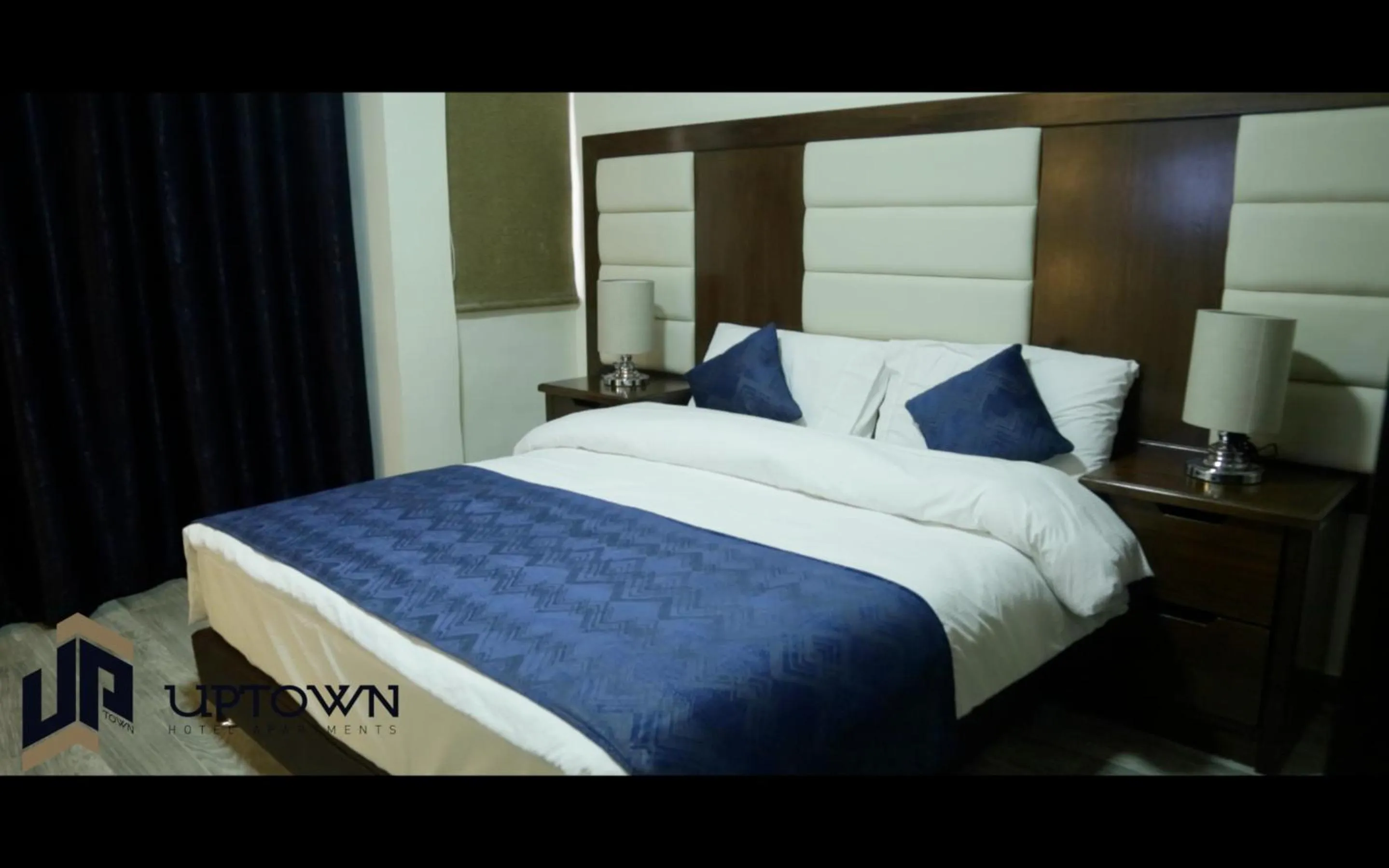 Bedroom in Uptown Hotel Apartment