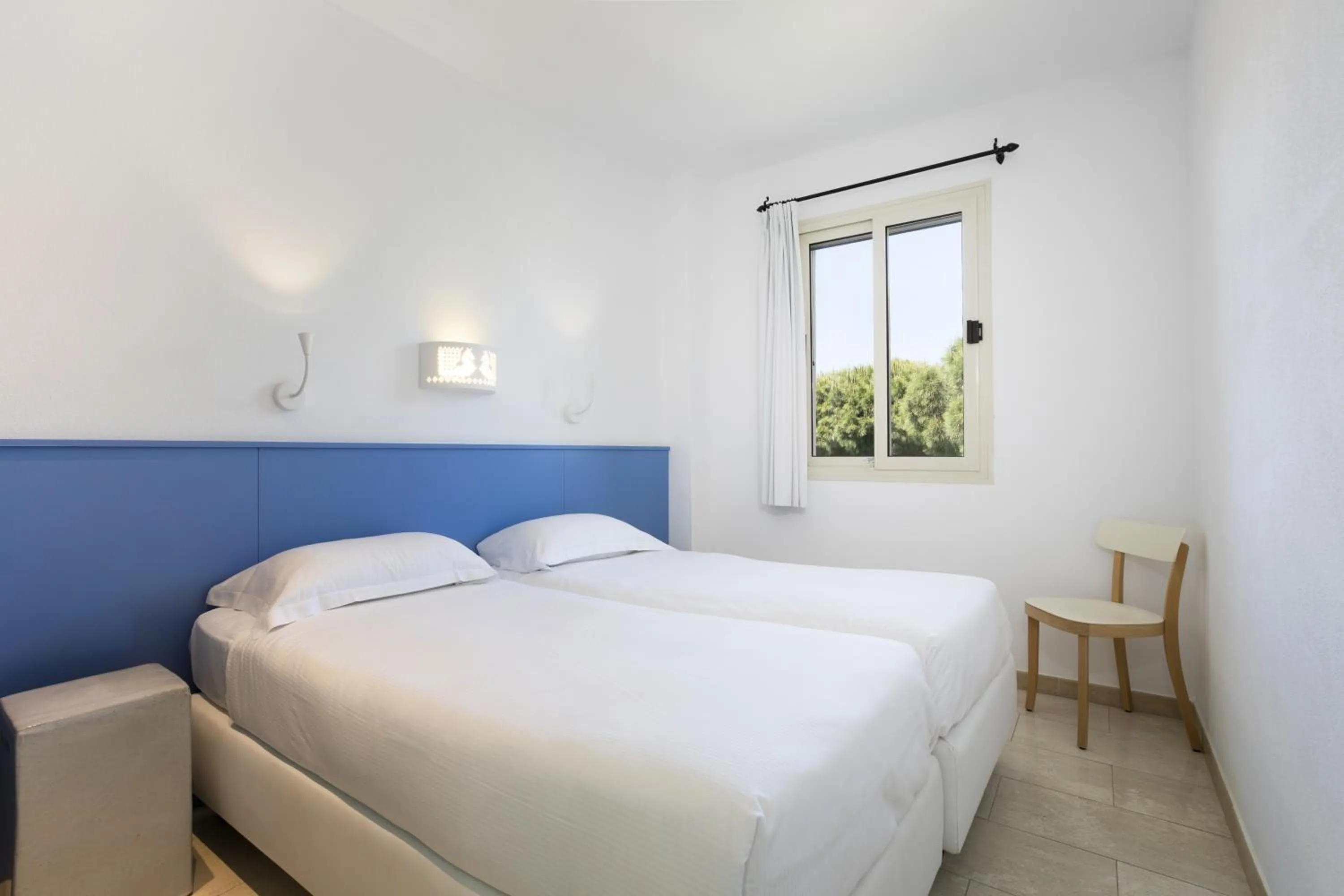 Bed in Sentido Tirreno Resort