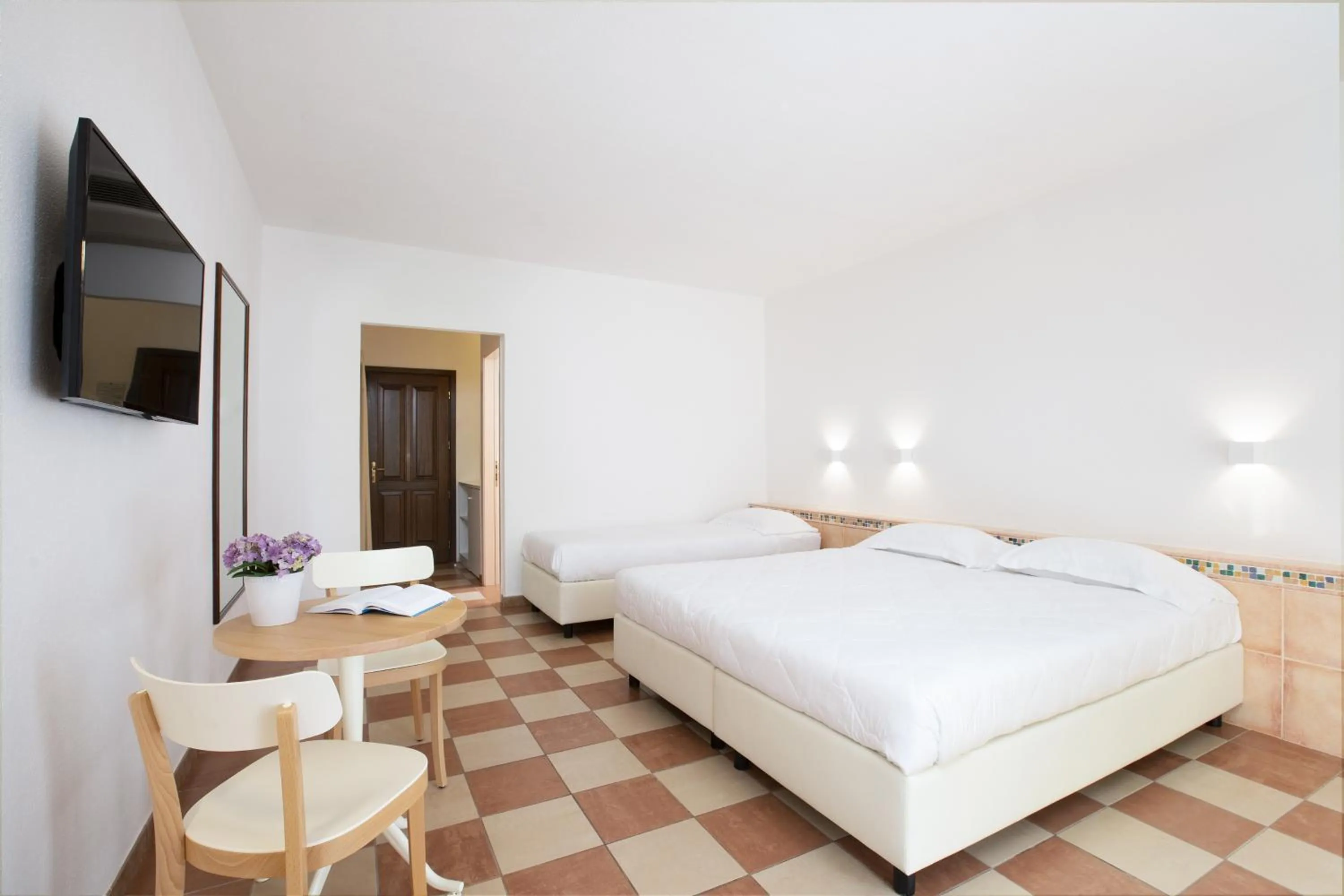 Bed in Sentido Tirreno Resort