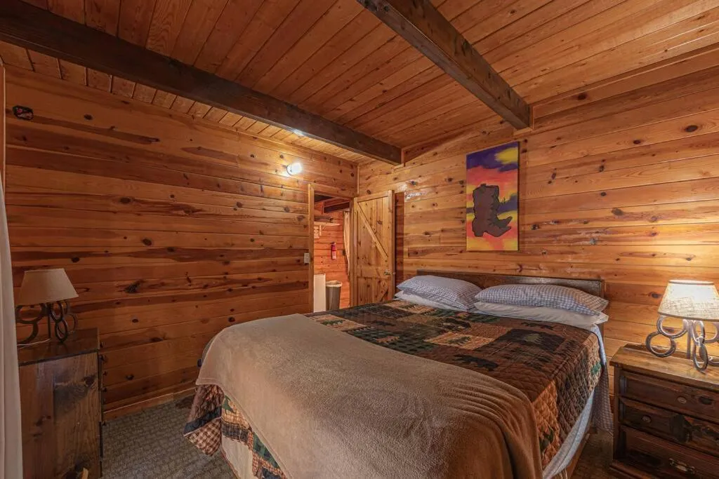 Bed in Forest Cabin 4 Cowboys Dream