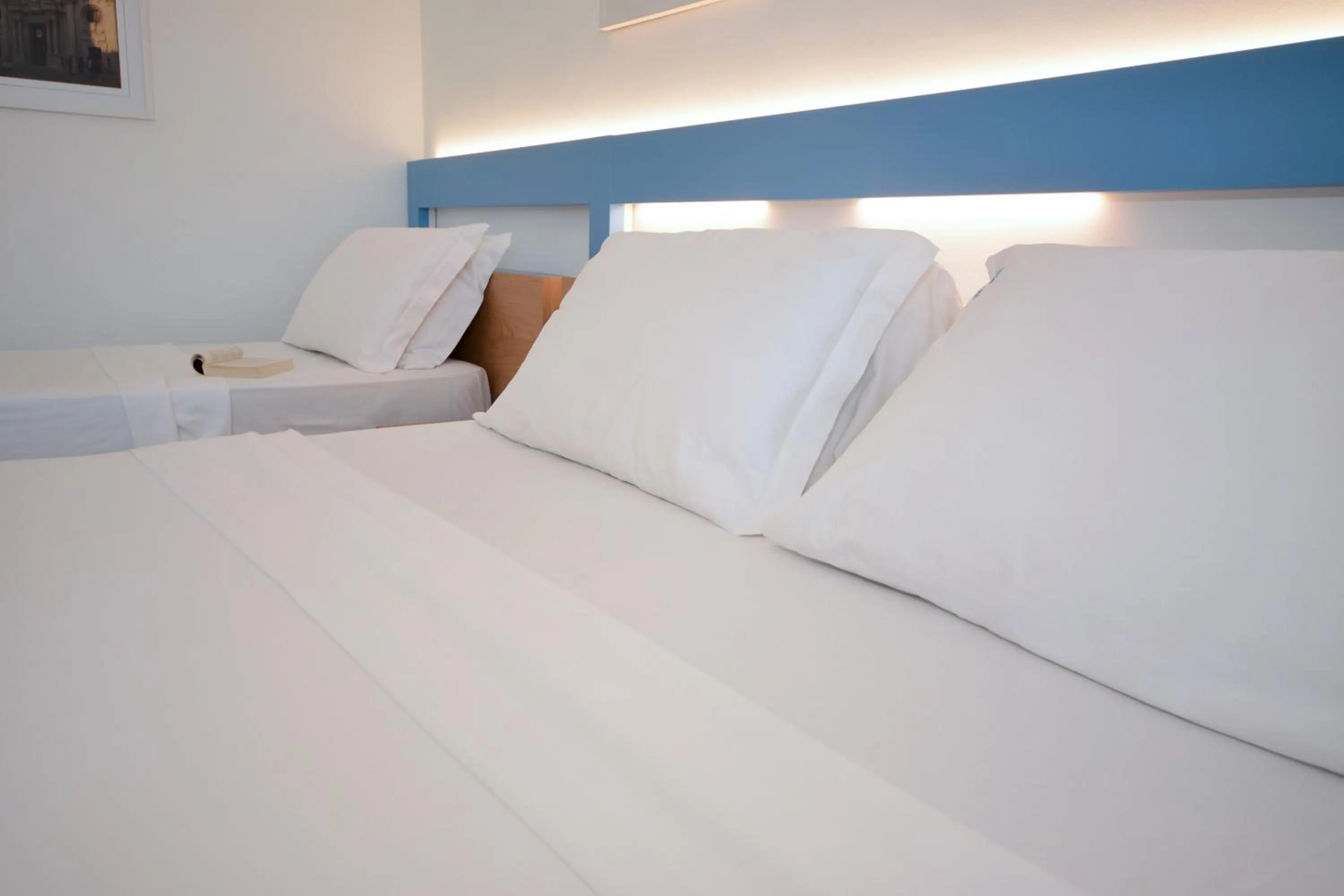 Bed in Hotel Miramare