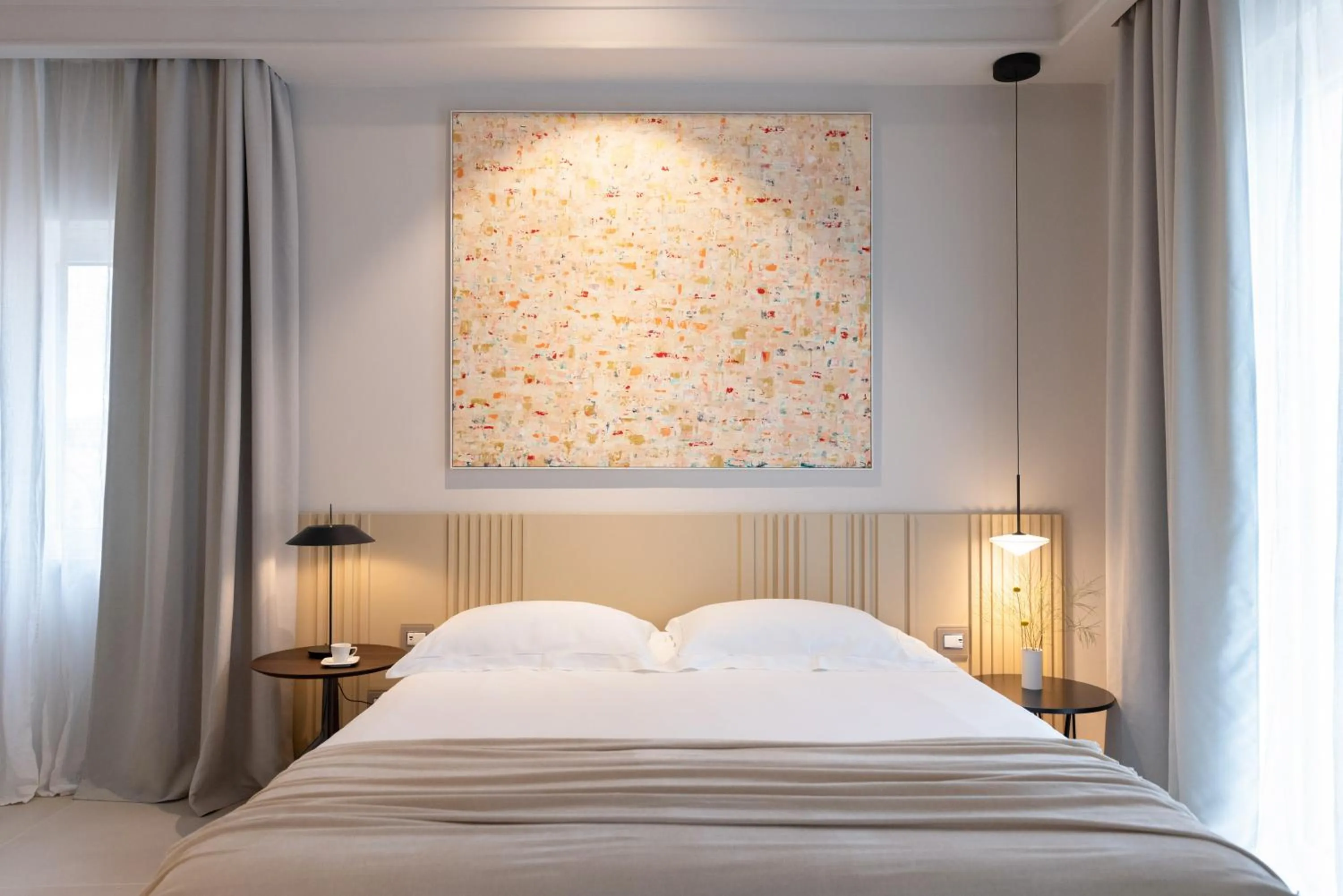 Bed in Taodomus Boutique Hotel