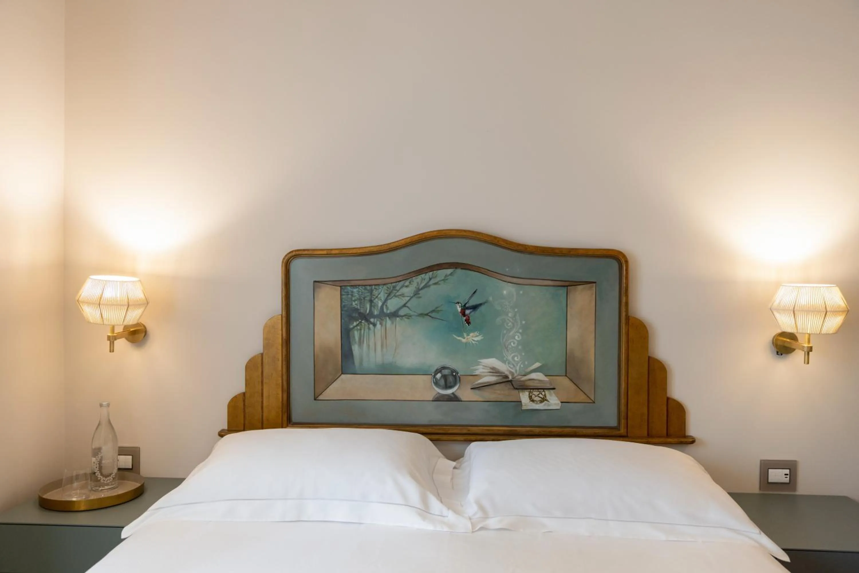 Bed in Taodomus Boutique Hotel