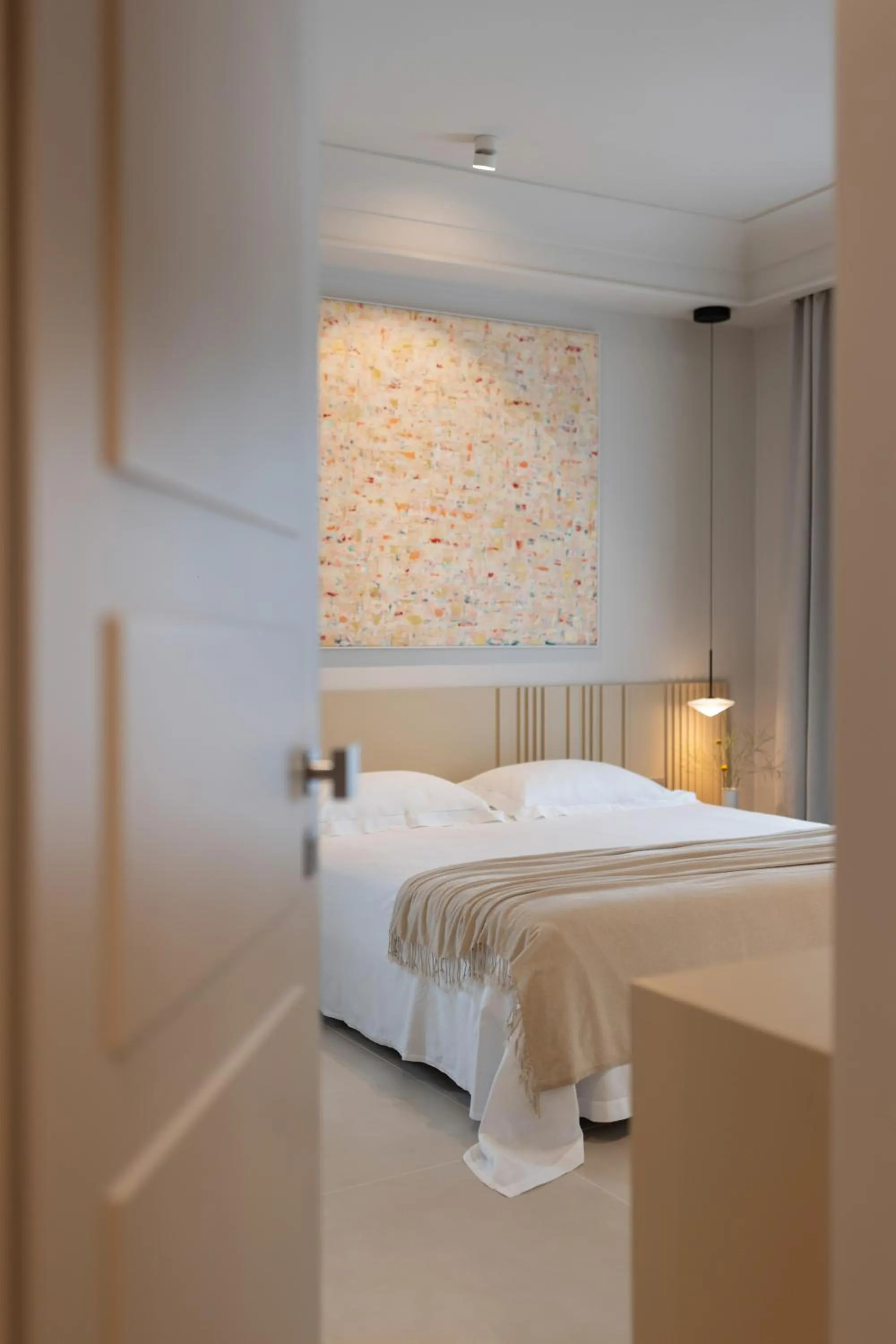 Bed in Taodomus Boutique Hotel