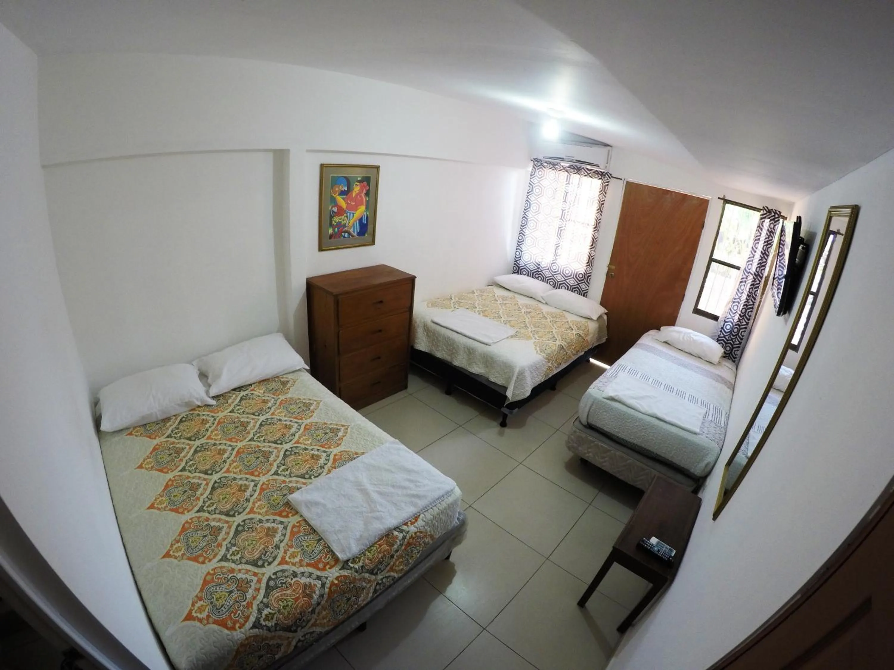 Double Room with Two Queen Beds - single occupancy in Casa Lucia