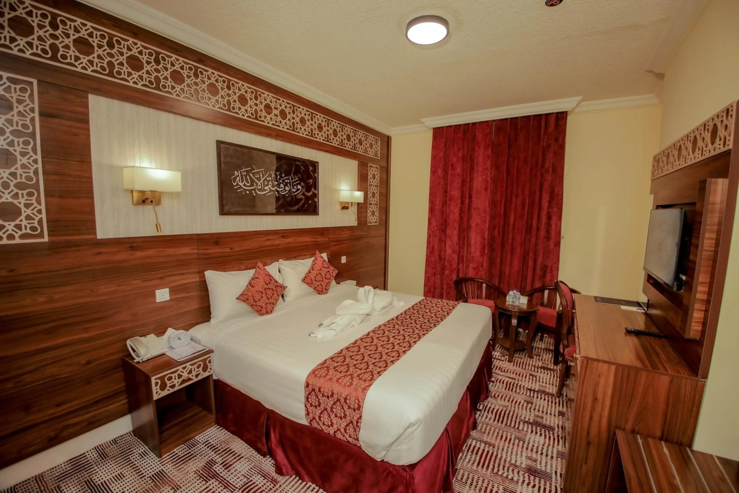 Bed in Abraj Al Tayseer Tuwa Hotel