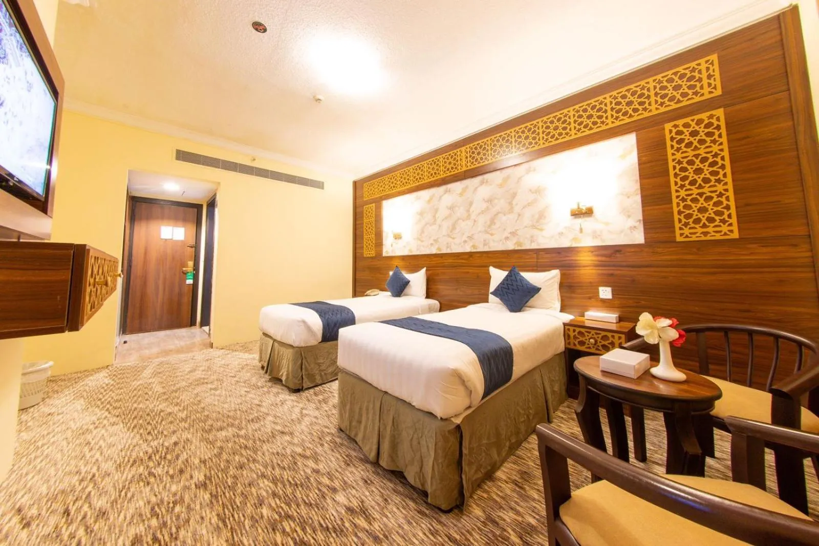 Bed in Abraj Al Tayseer Tuwa Hotel