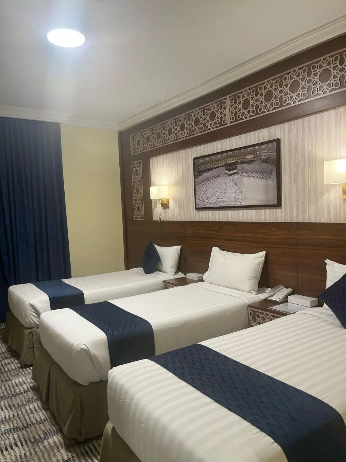 Bed in Abraj Al Tayseer Tuwa Hotel