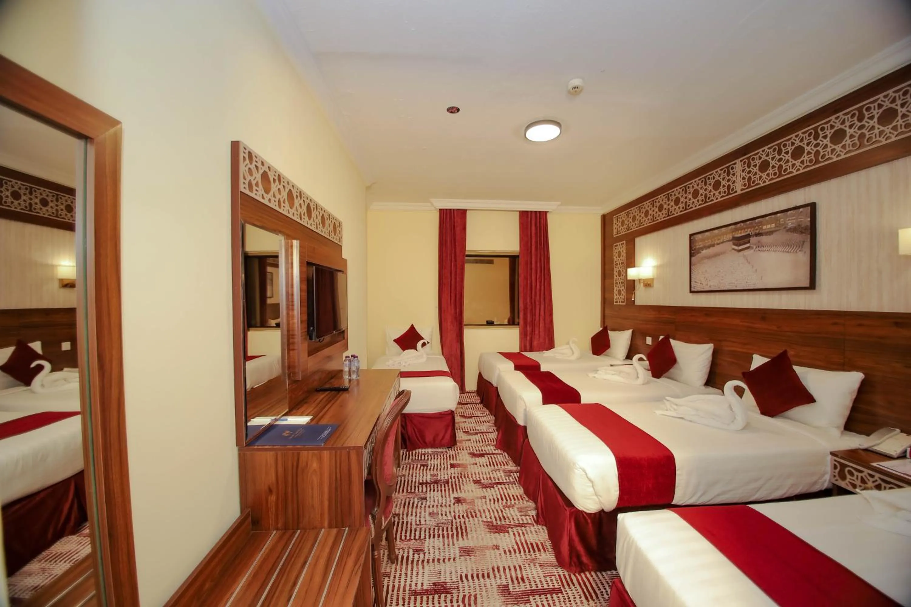 Bed in Abraj Al Tayseer Tuwa Hotel
