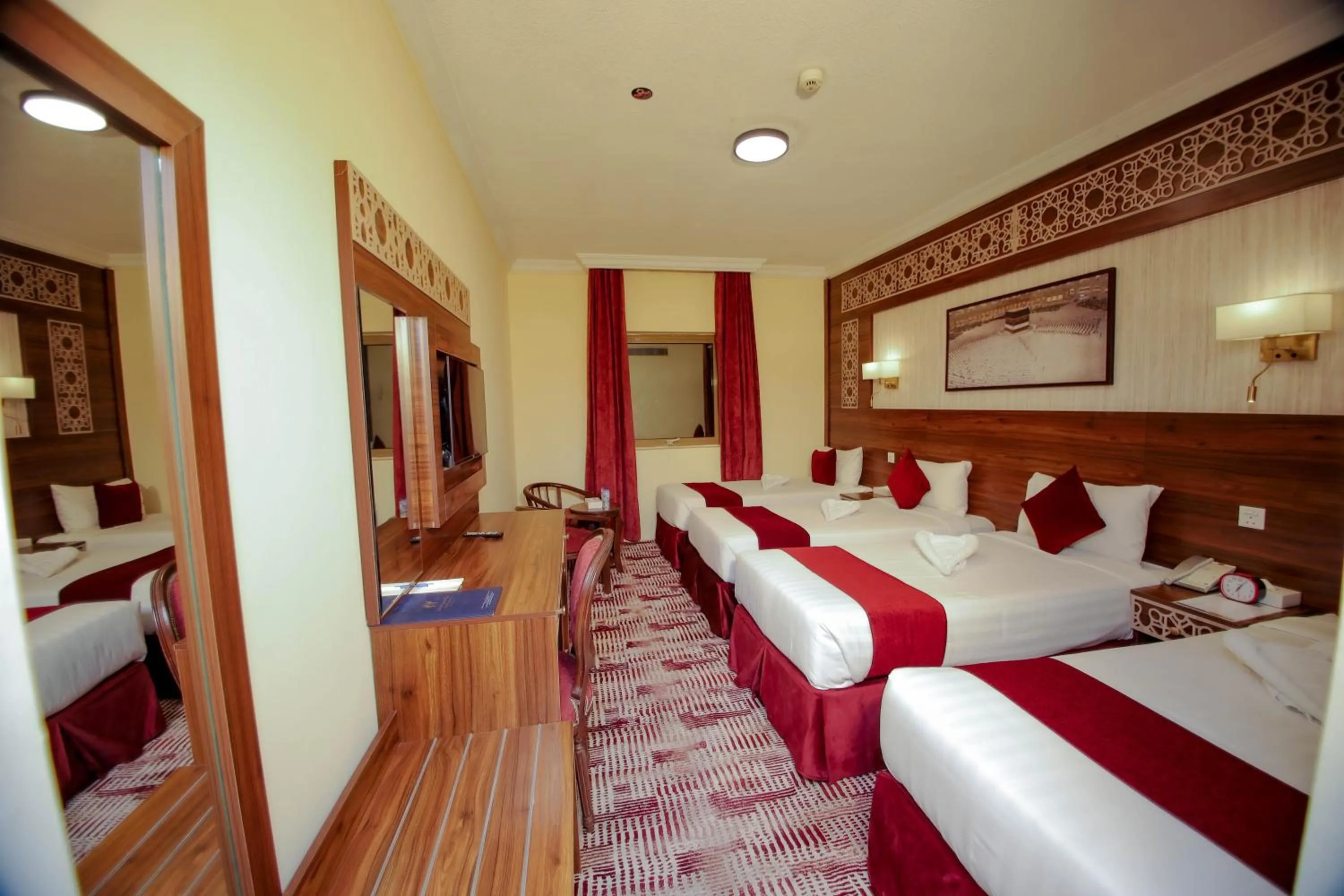 Bed in Abraj Al Tayseer Tuwa Hotel