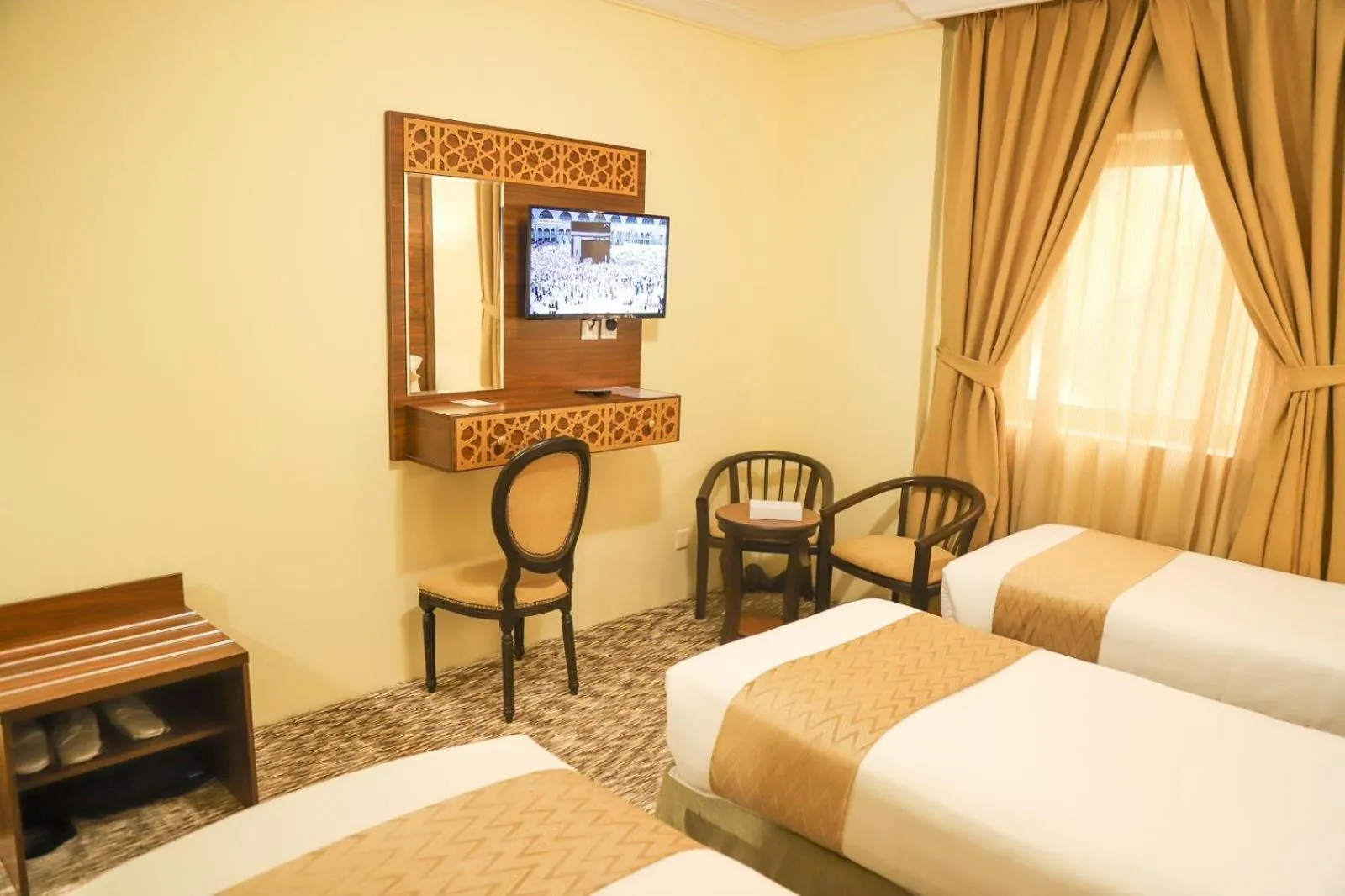 Bed in Abraj Al Tayseer Tuwa Hotel
