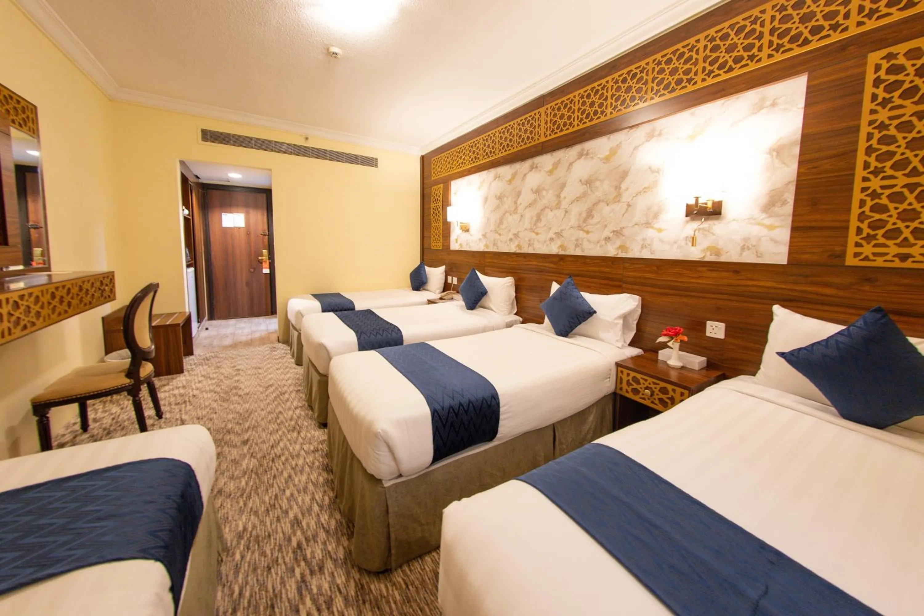 Bed in Abraj Al Tayseer Tuwa Hotel