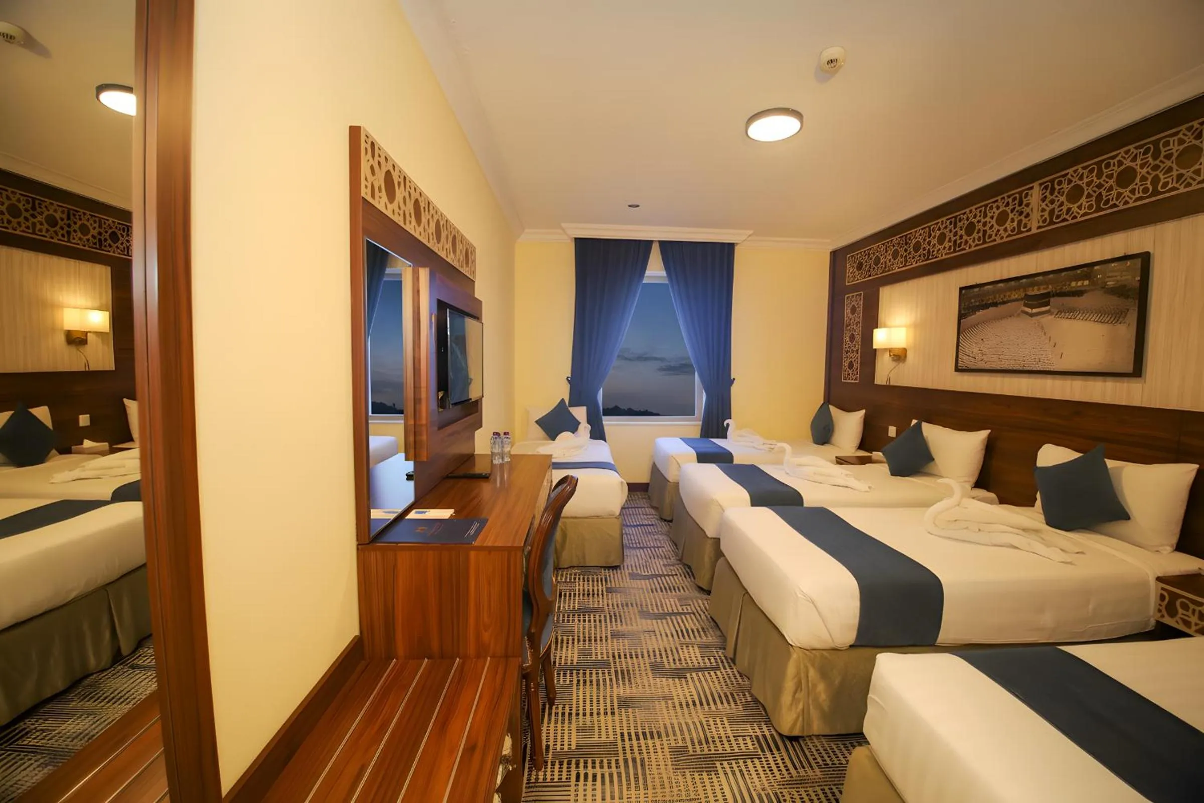 Bed in Abraj Al Tayseer Tuwa Hotel