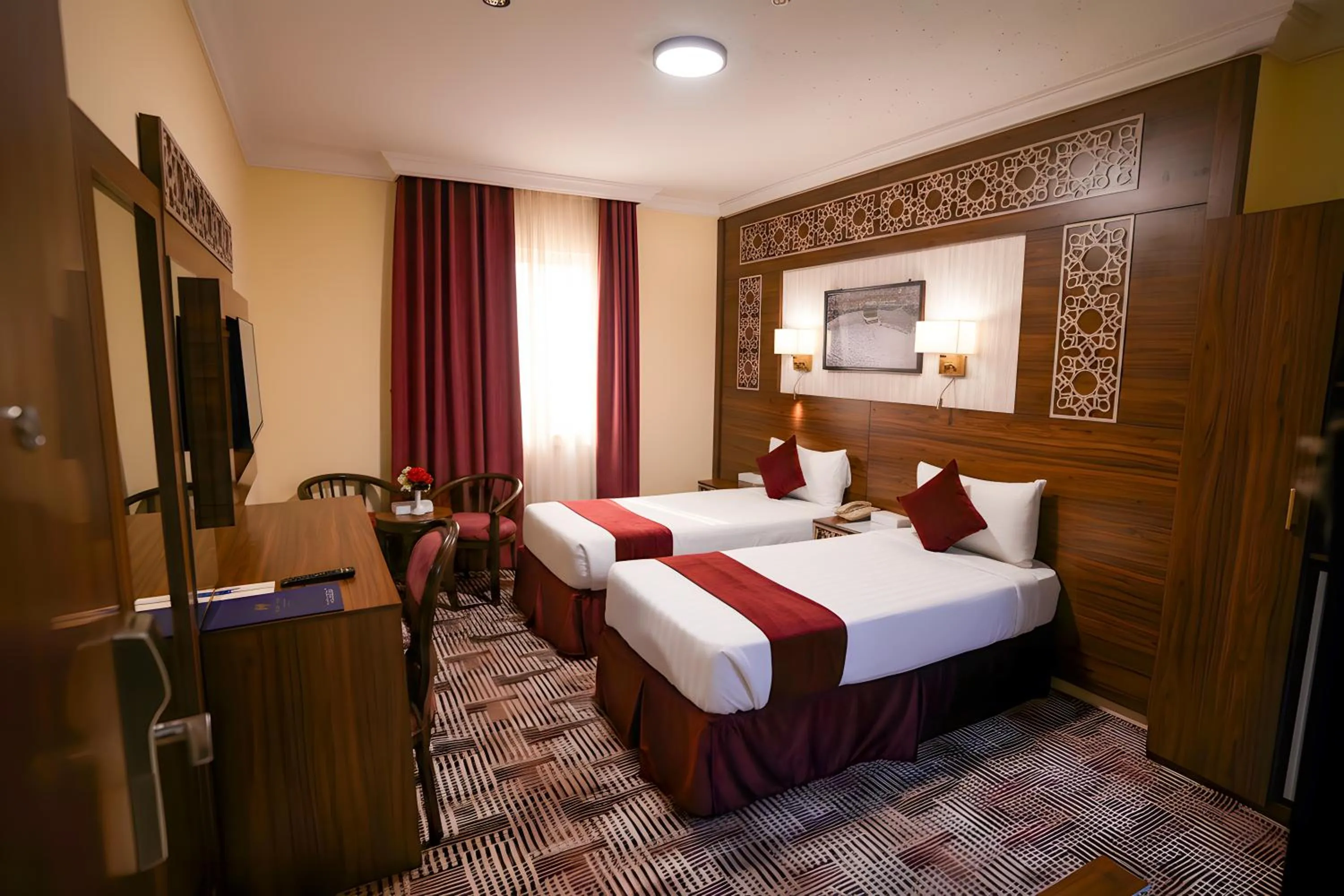 Bed in Abraj Al Tayseer Tuwa Hotel