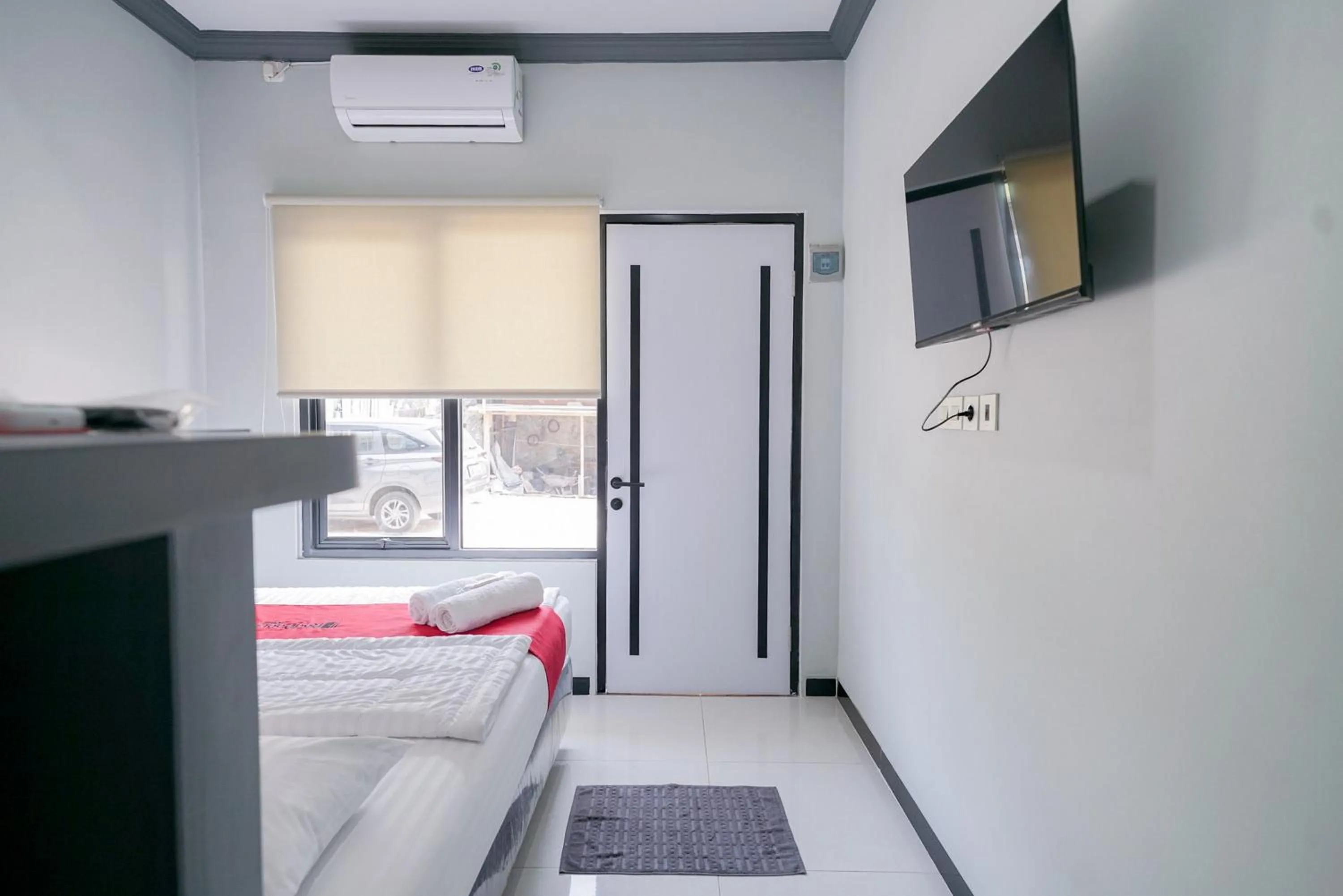 Bed in RedDoorz Syariah At Jalan Endro Suratmin Lampung