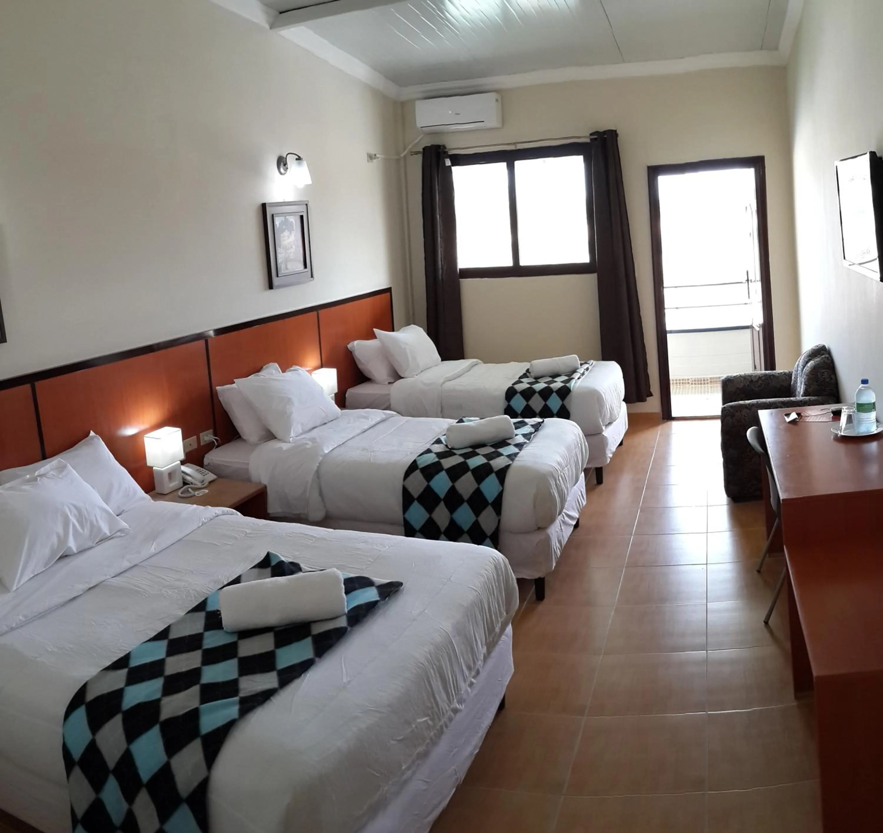 Day, Bed in Express Inn Coronado & Camping