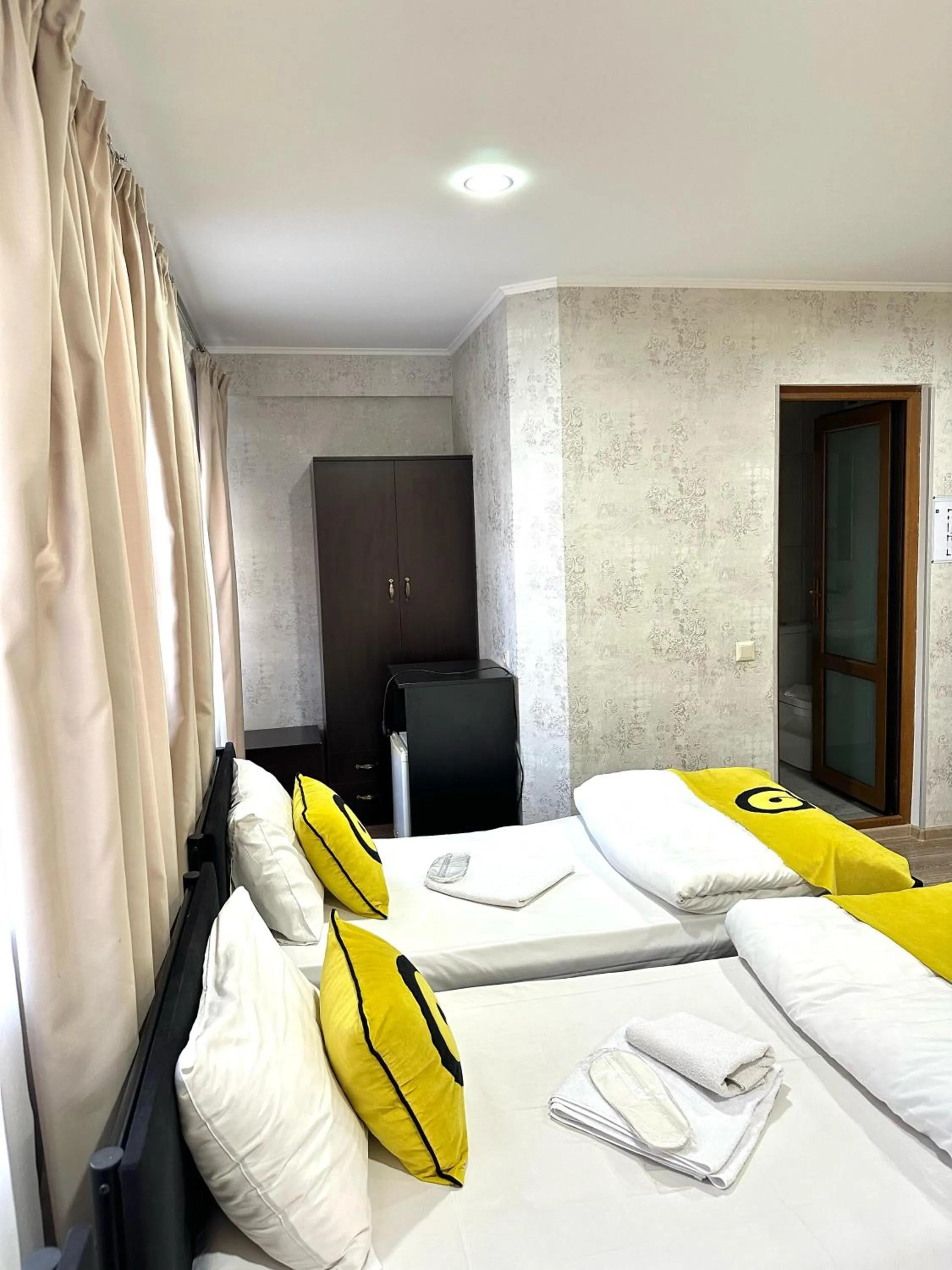 Bed in Hotel Aira Plaza