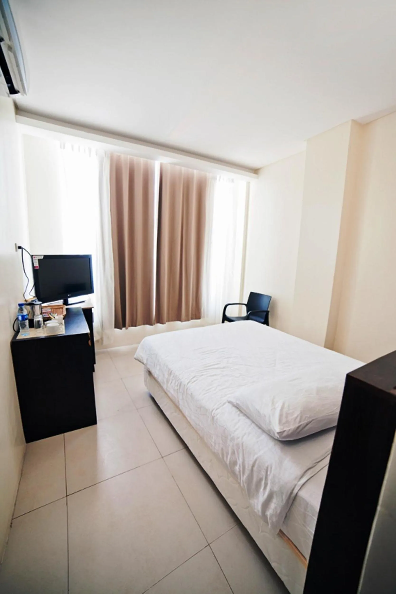 Bedroom, Bed in Ocean Suites Bohol Boutique Hotel