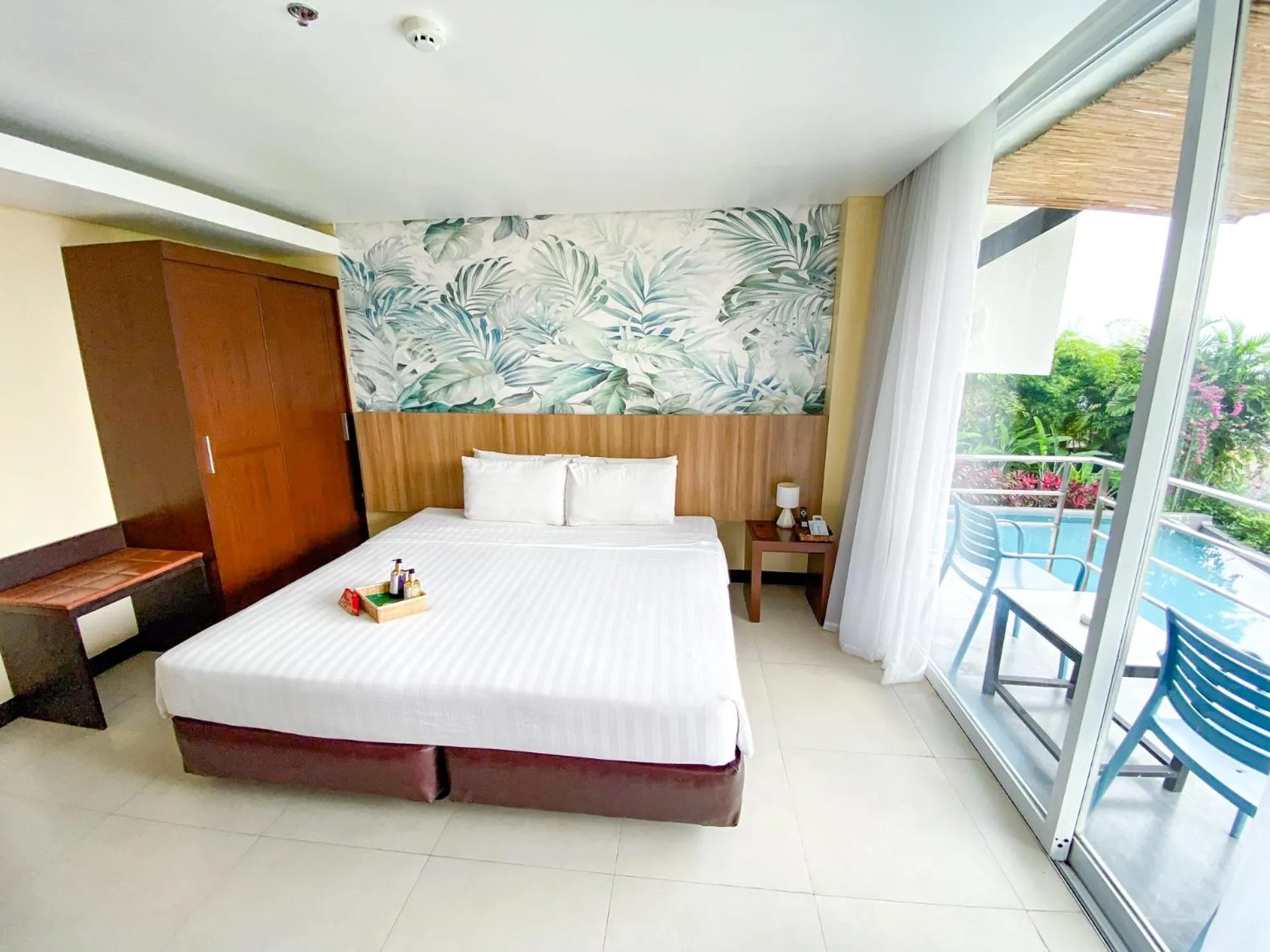 Bed in Ocean Suites Bohol Boutique Hotel