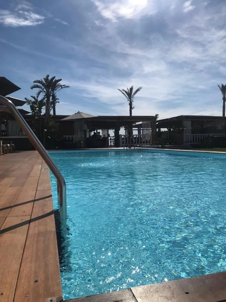 Swimming pool in Cumeja Beach Club & Hotel