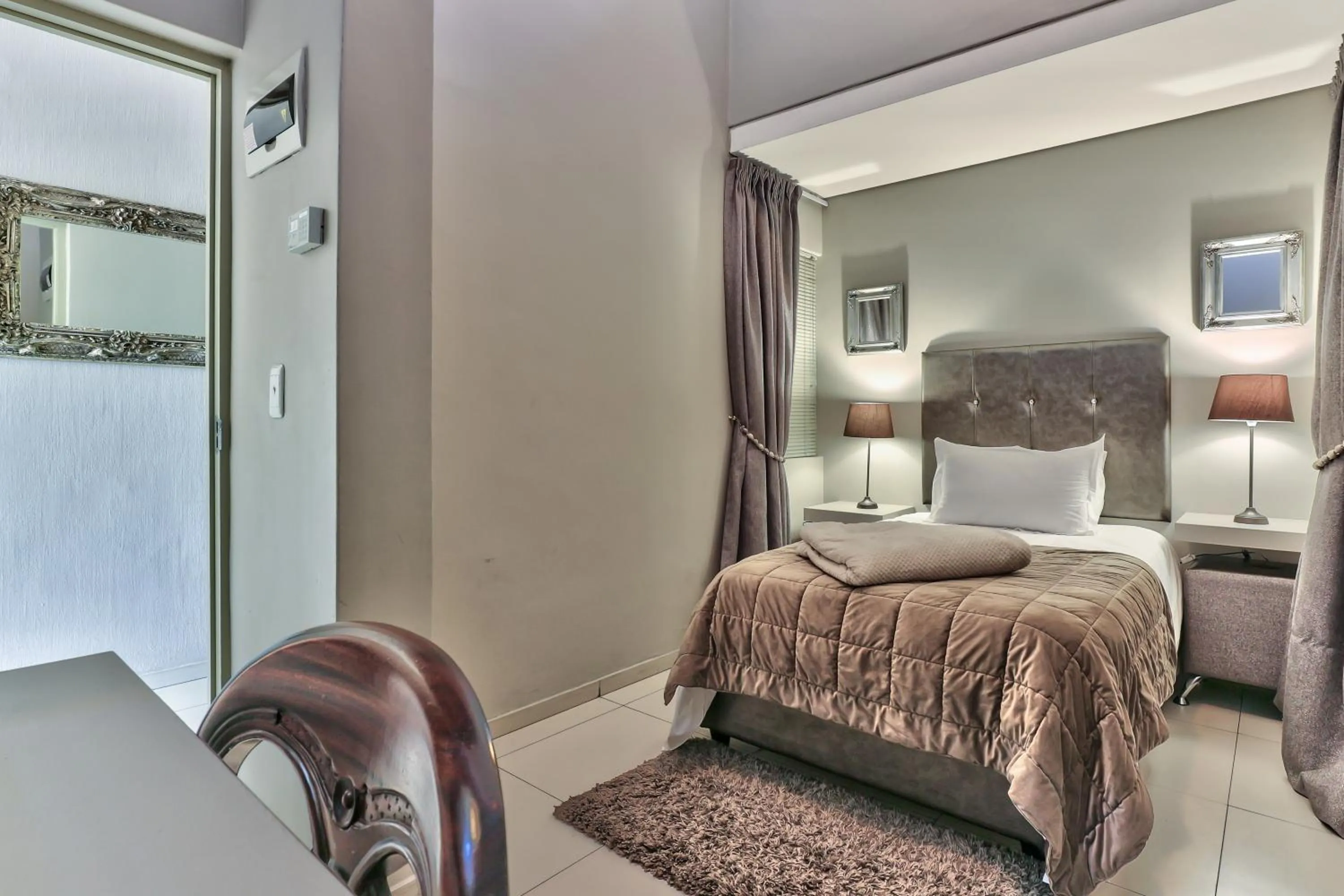 Bed in Heritage Square Apartments