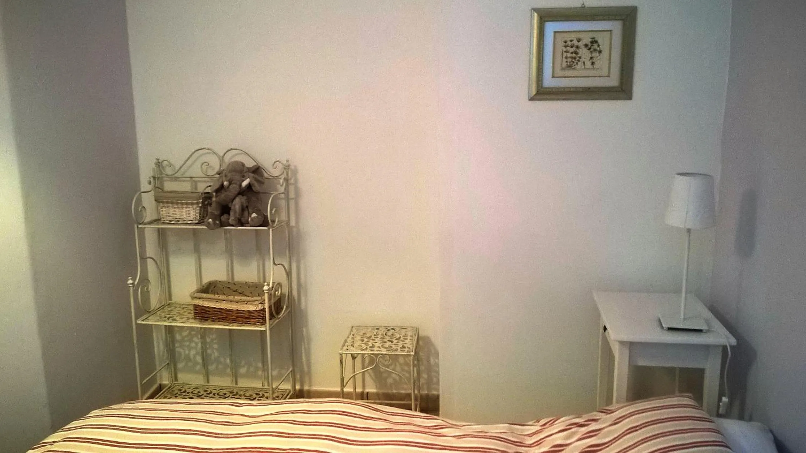 Photo of the whole room, Bed in Appartamenti Urbevetus