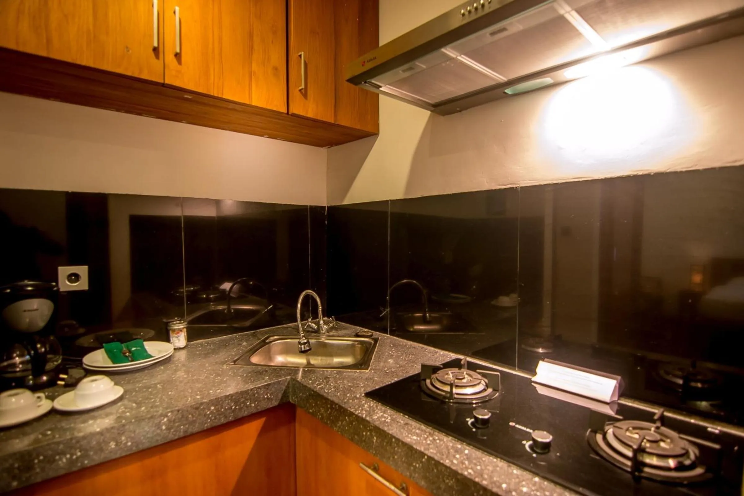 Kitchen or kitchenette in Delu Villas & Suite