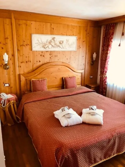 Bed in Hotel Paradiso