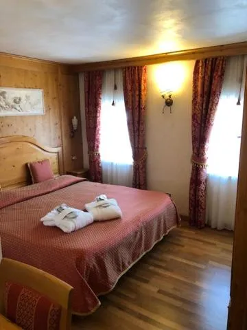 Bed in Hotel Paradiso