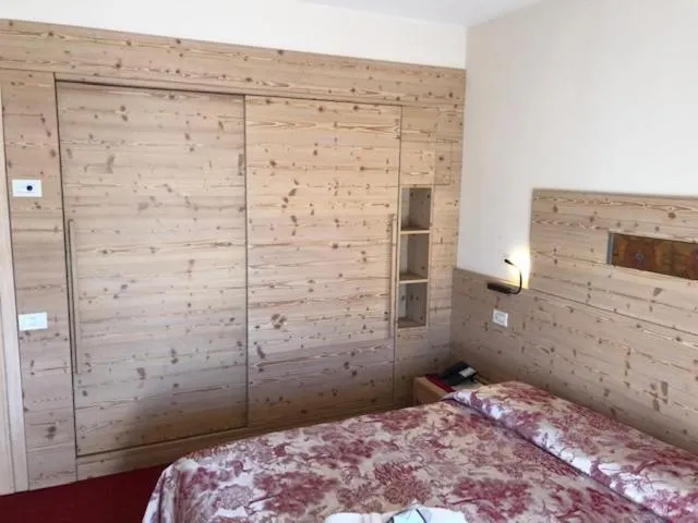 Bed in Hotel Paradiso