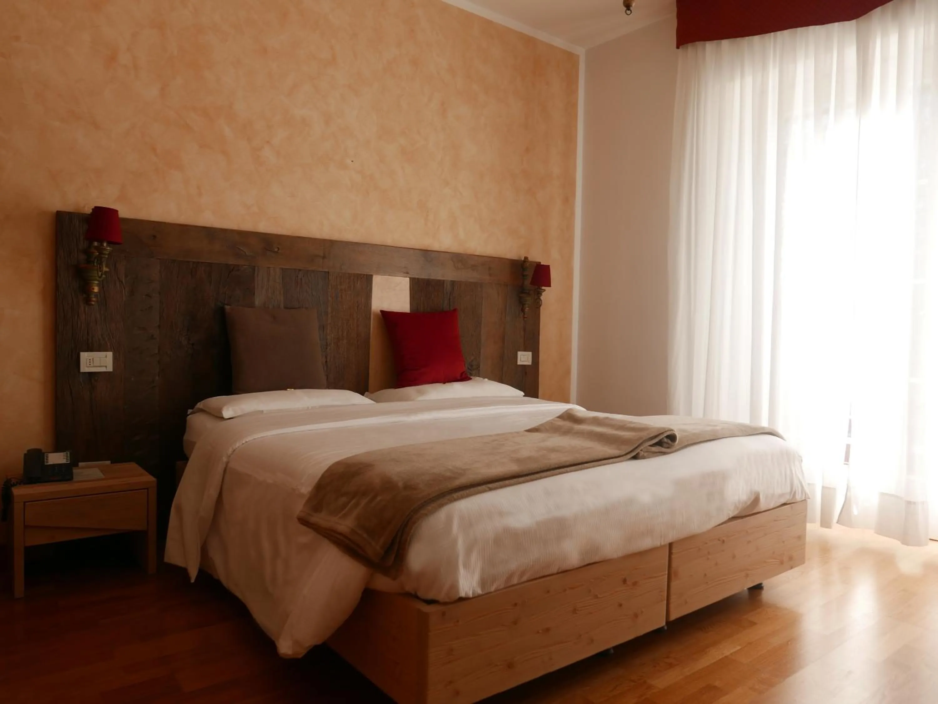 Bed in Hotel Paradiso