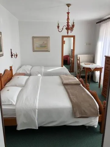 Bed in Hotel Paradiso