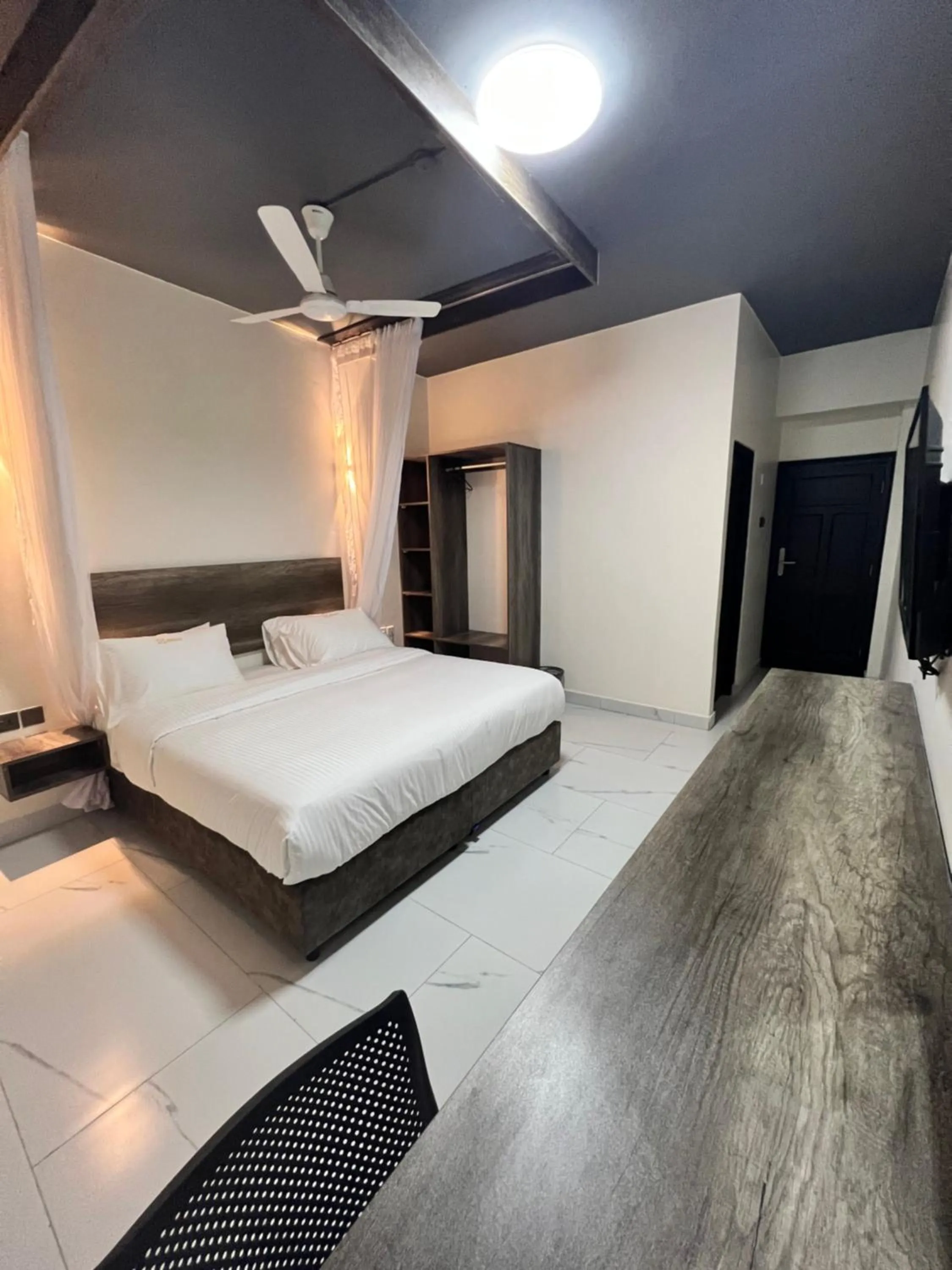 Bed in The Ivory Suites