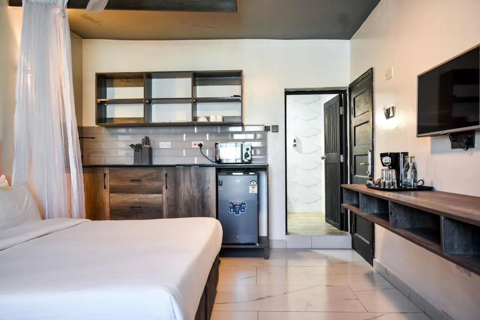 Bed in The Ivory Suites