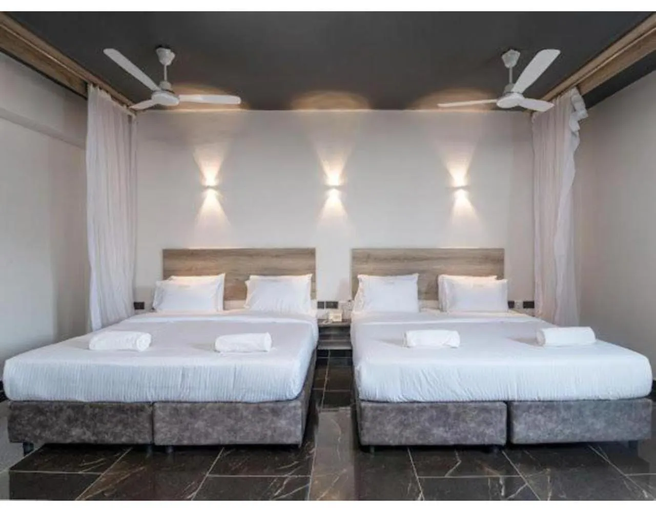 Bed in The Ivory Suites