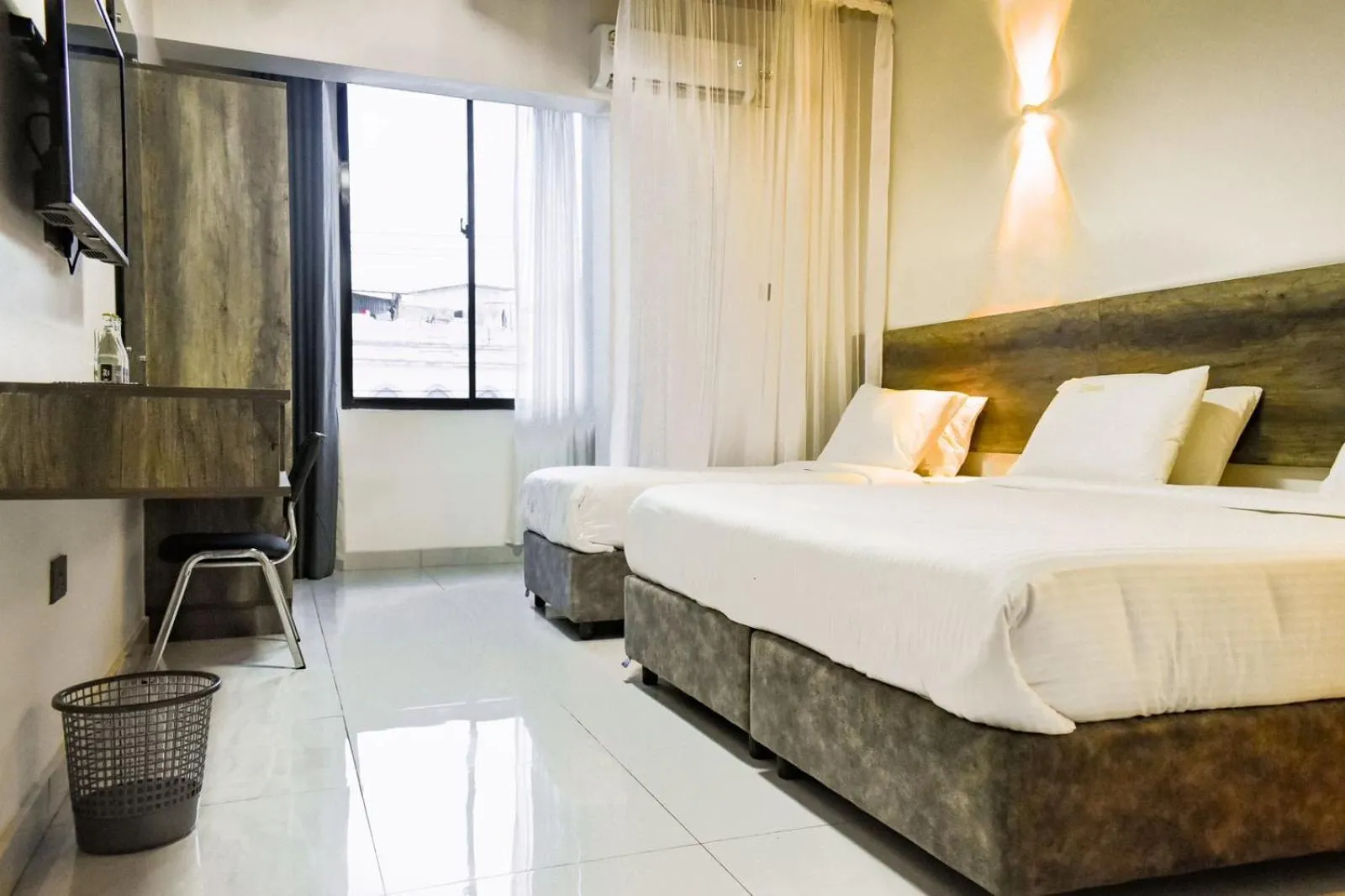 Bed in The Ivory Suites