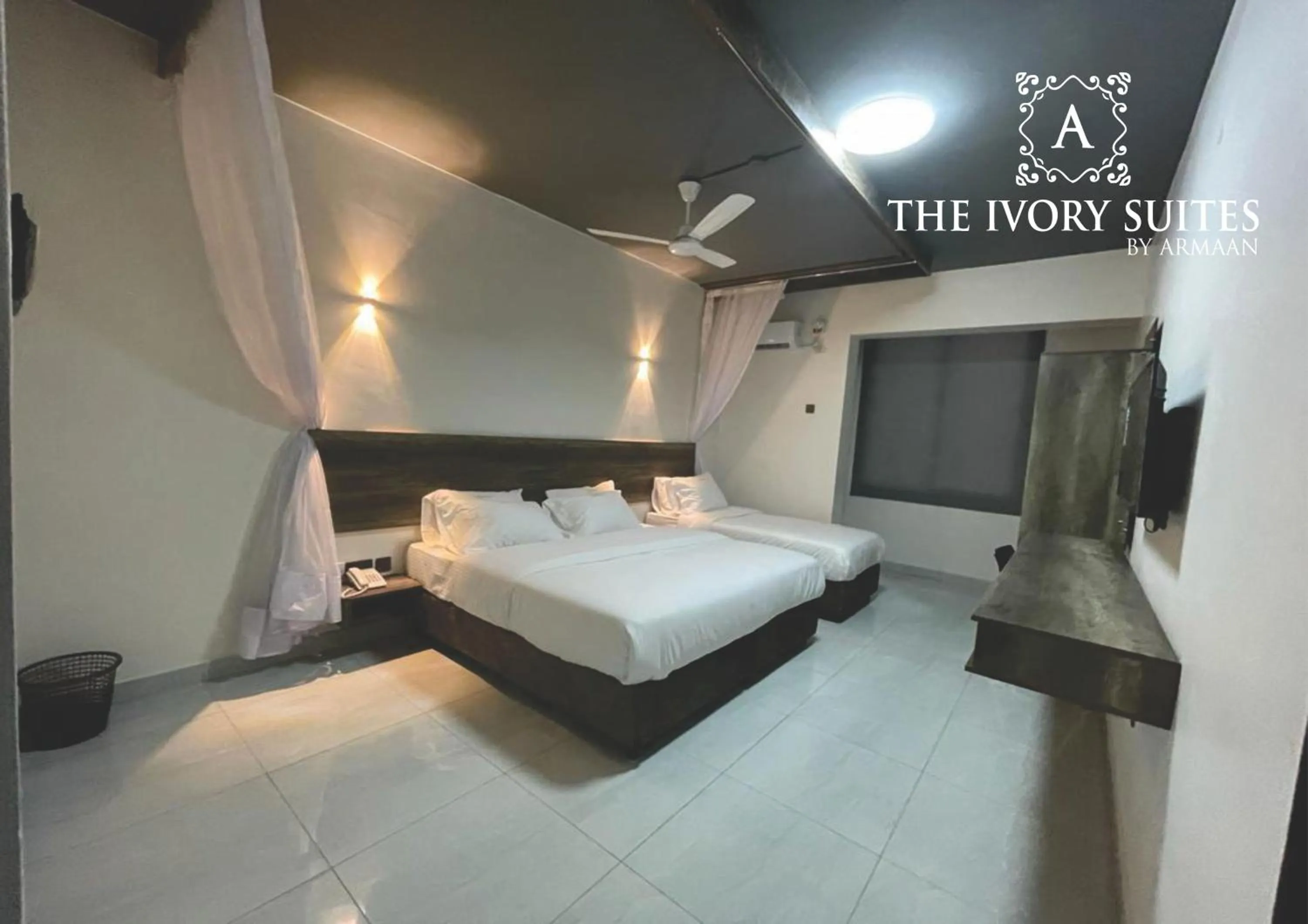 Bed in The Ivory Suites
