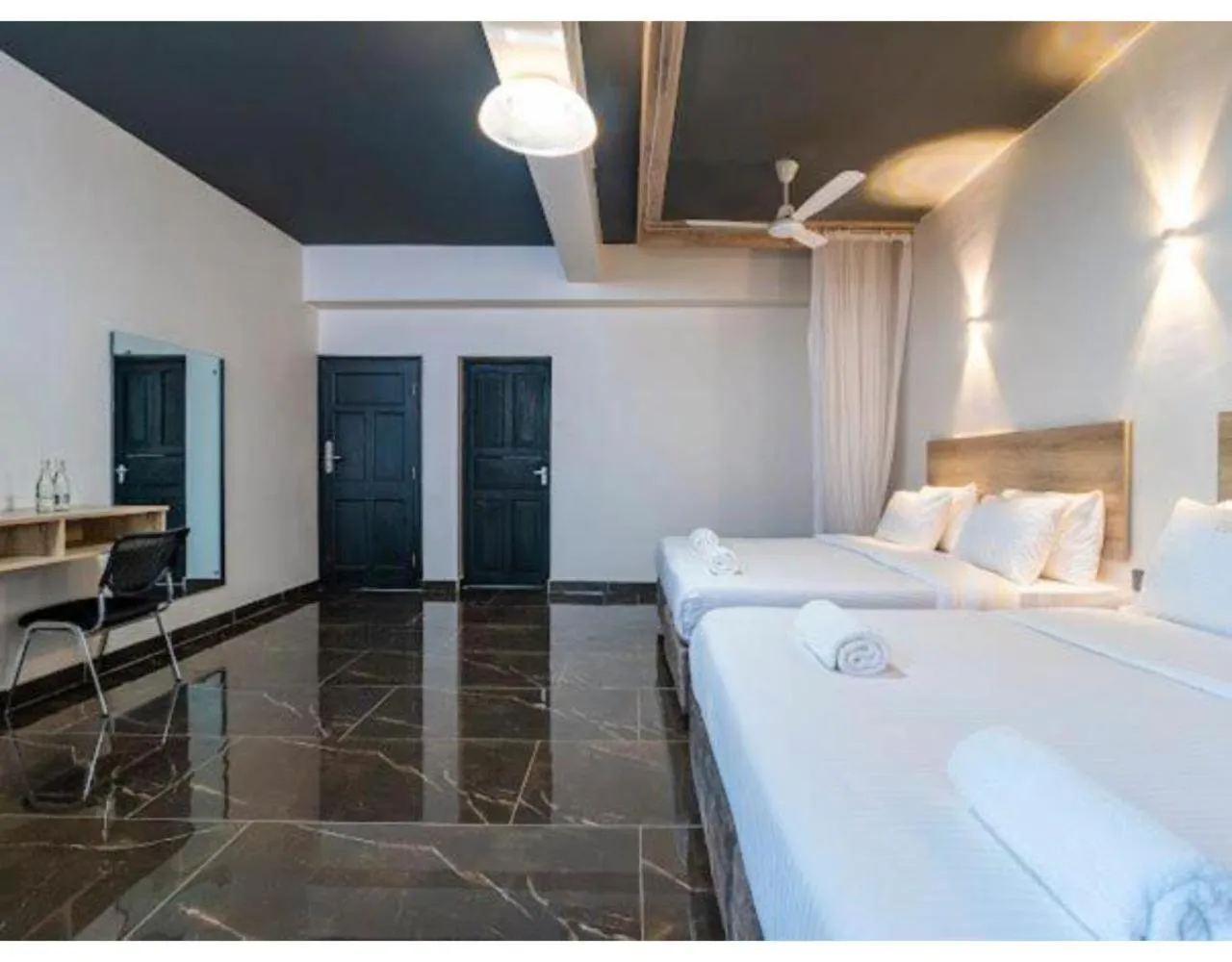 Bed in The Ivory Suites