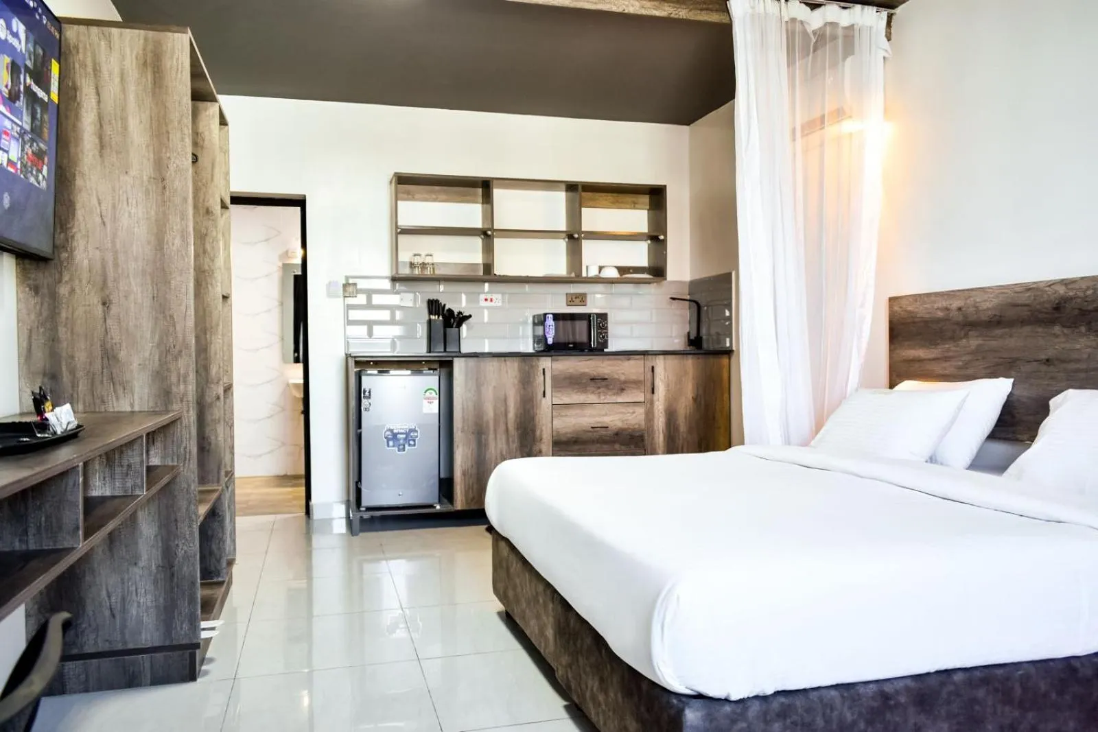 Bed in The Ivory Suites