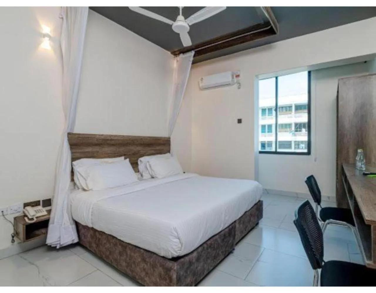 Bed in The Ivory Suites