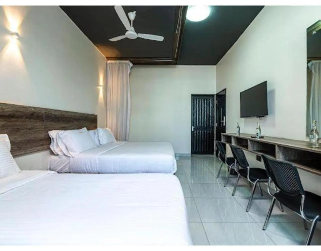 Bed in The Ivory Suites