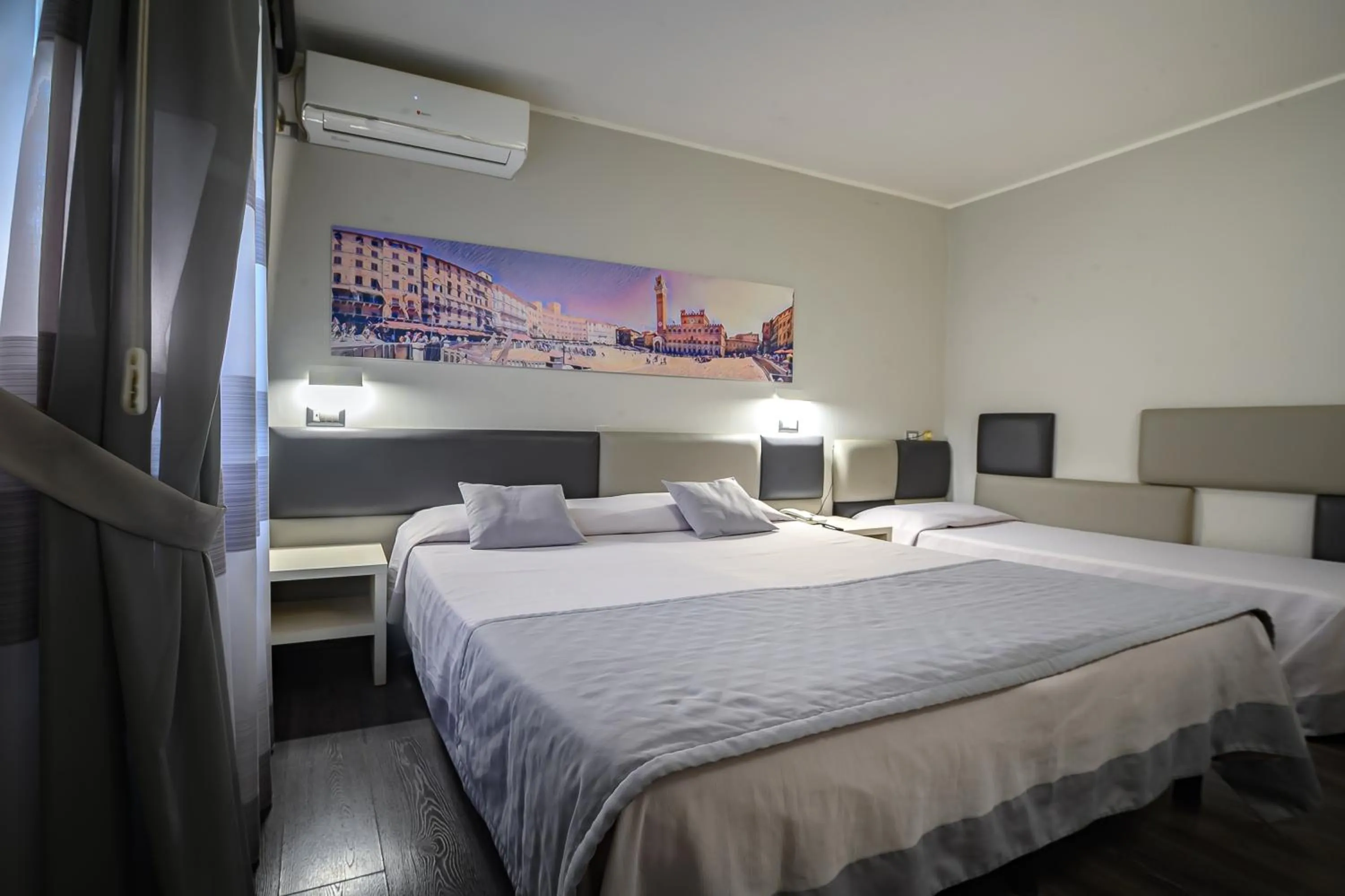 Bed in Hotel Anna Siena Nord